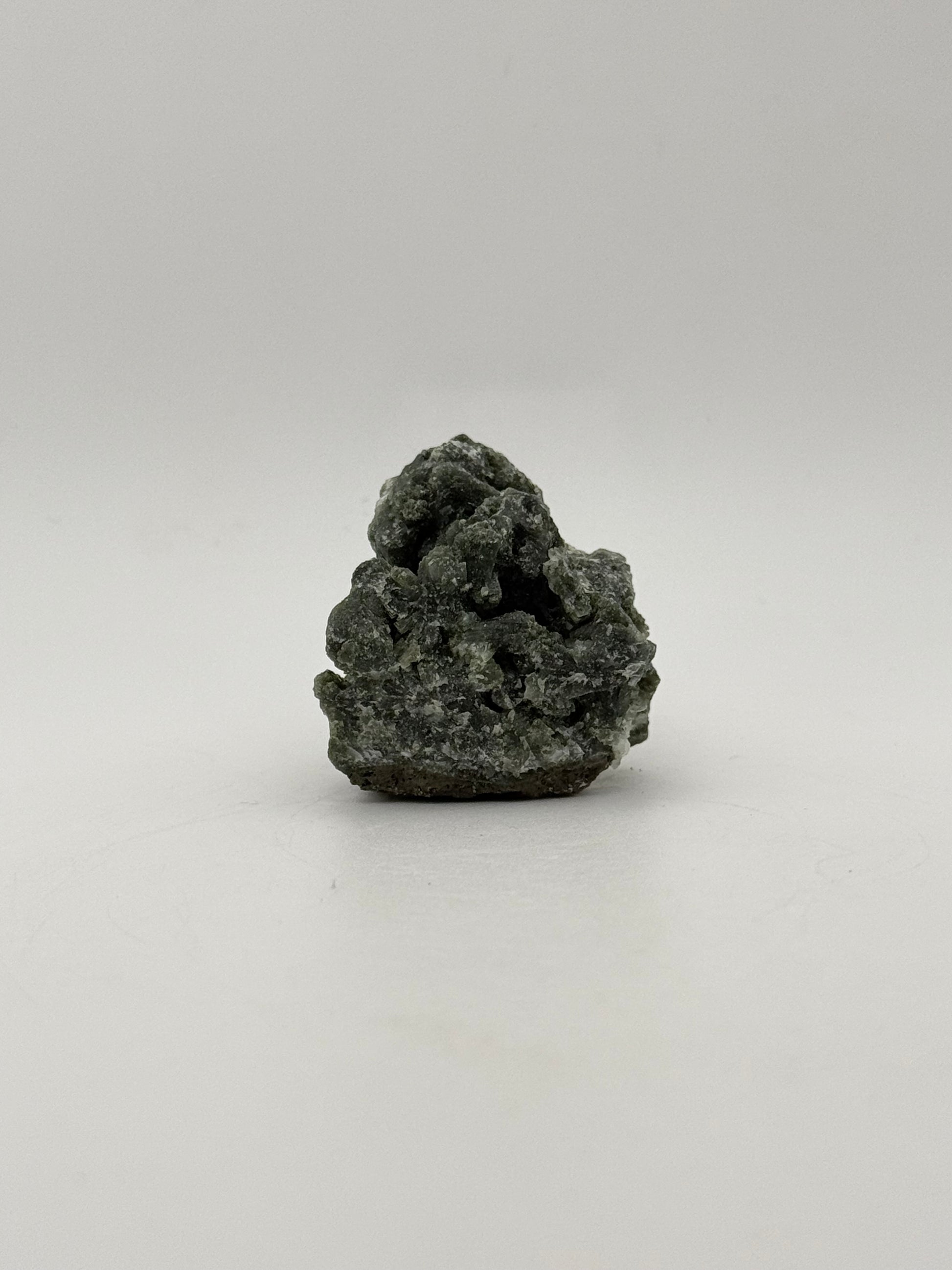 Raw prehnite specimen with amazing green color.