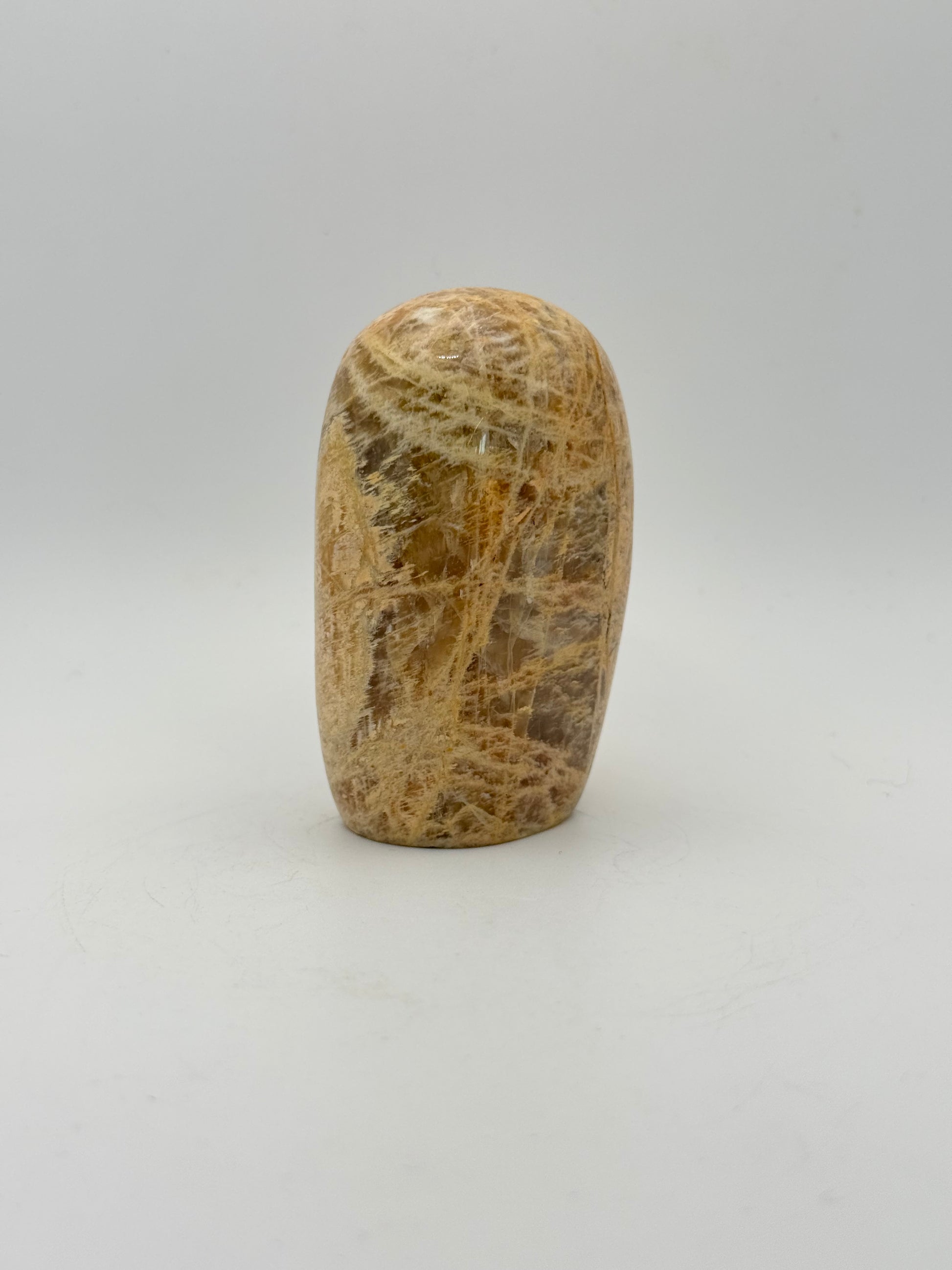Polished yellow moonstone free form.