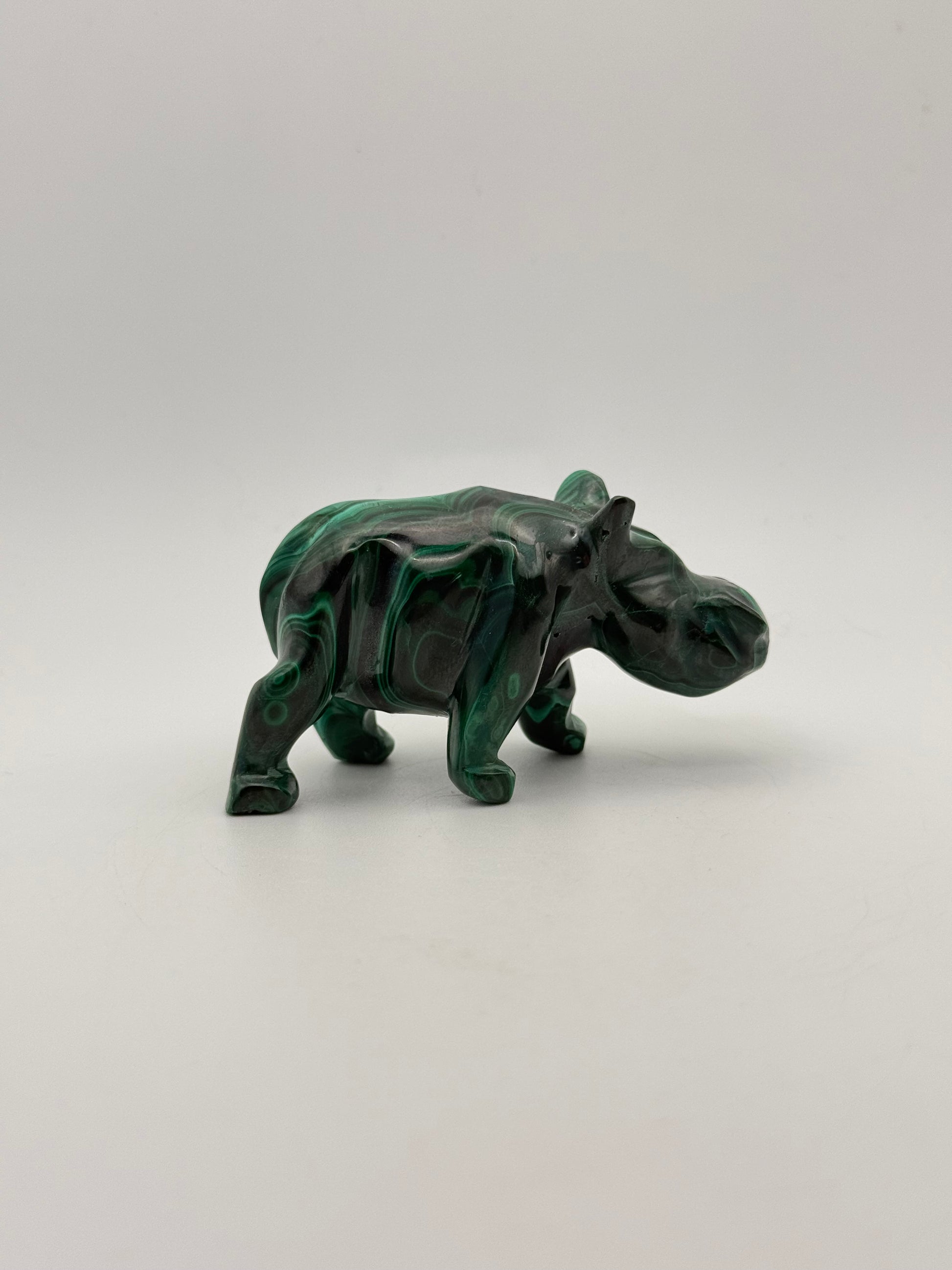 Malachite rhino carving.