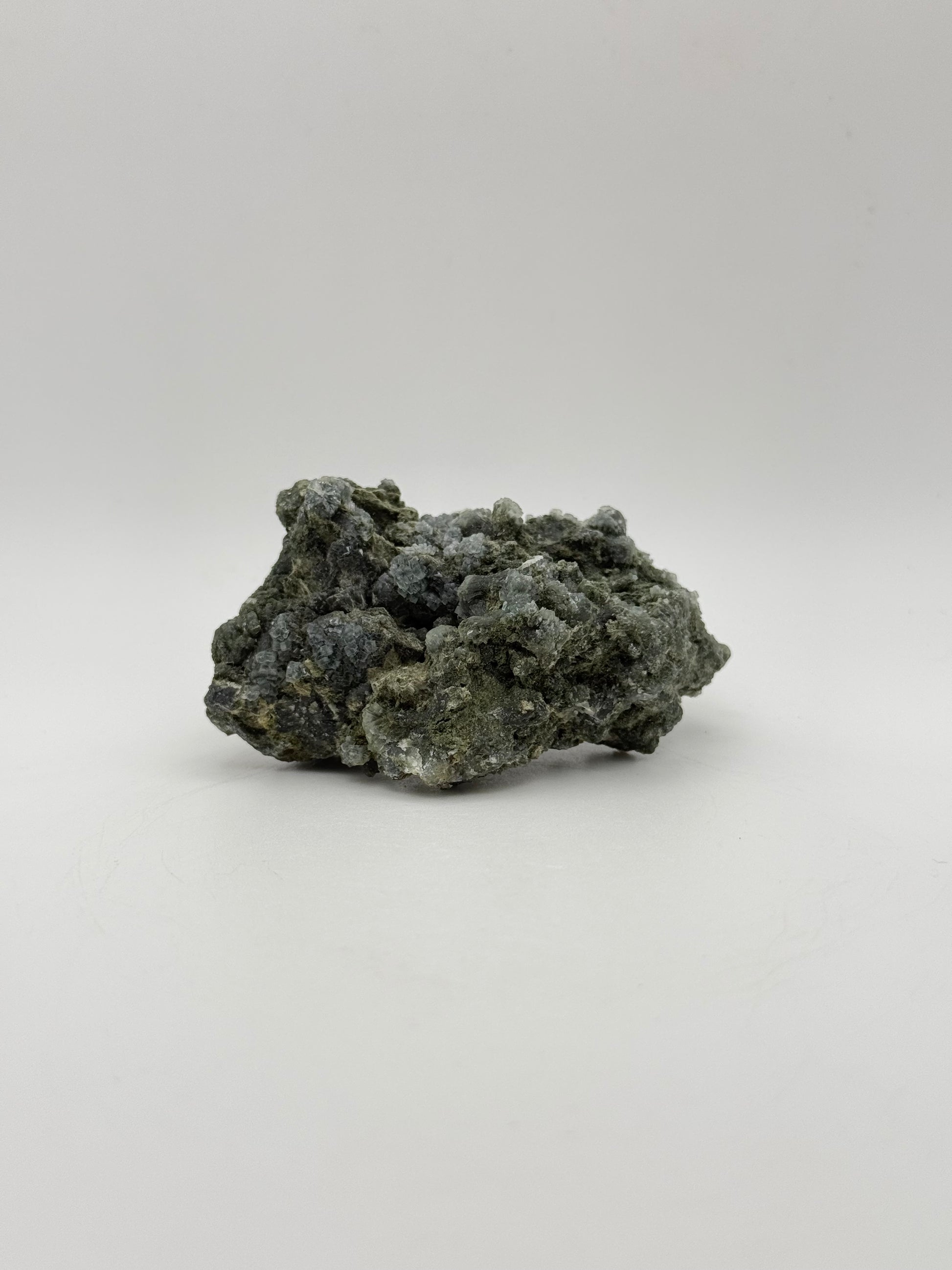 Raw prehnite specimen with amazing green color.