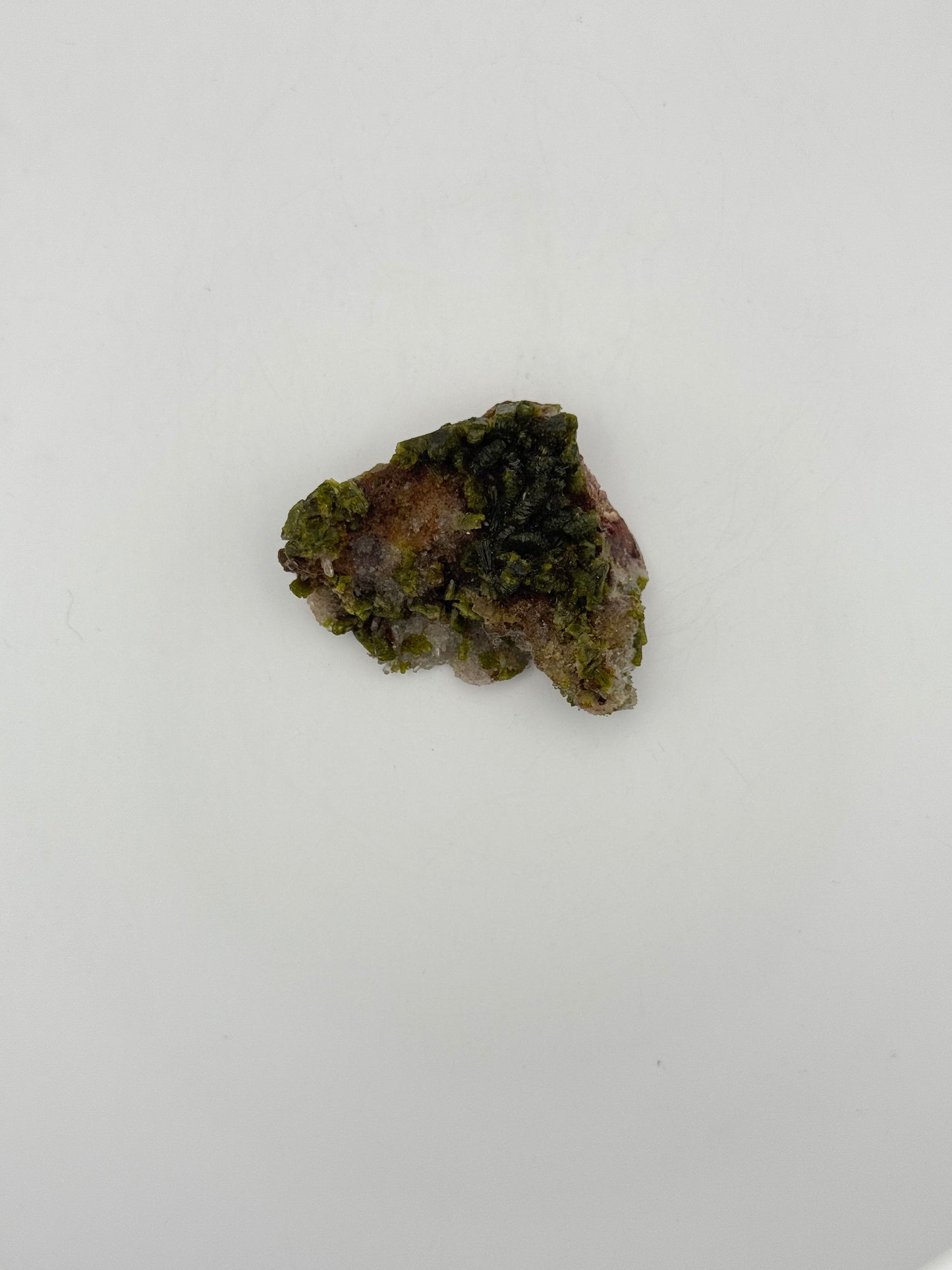 Epidote crystal cluster with good green color.