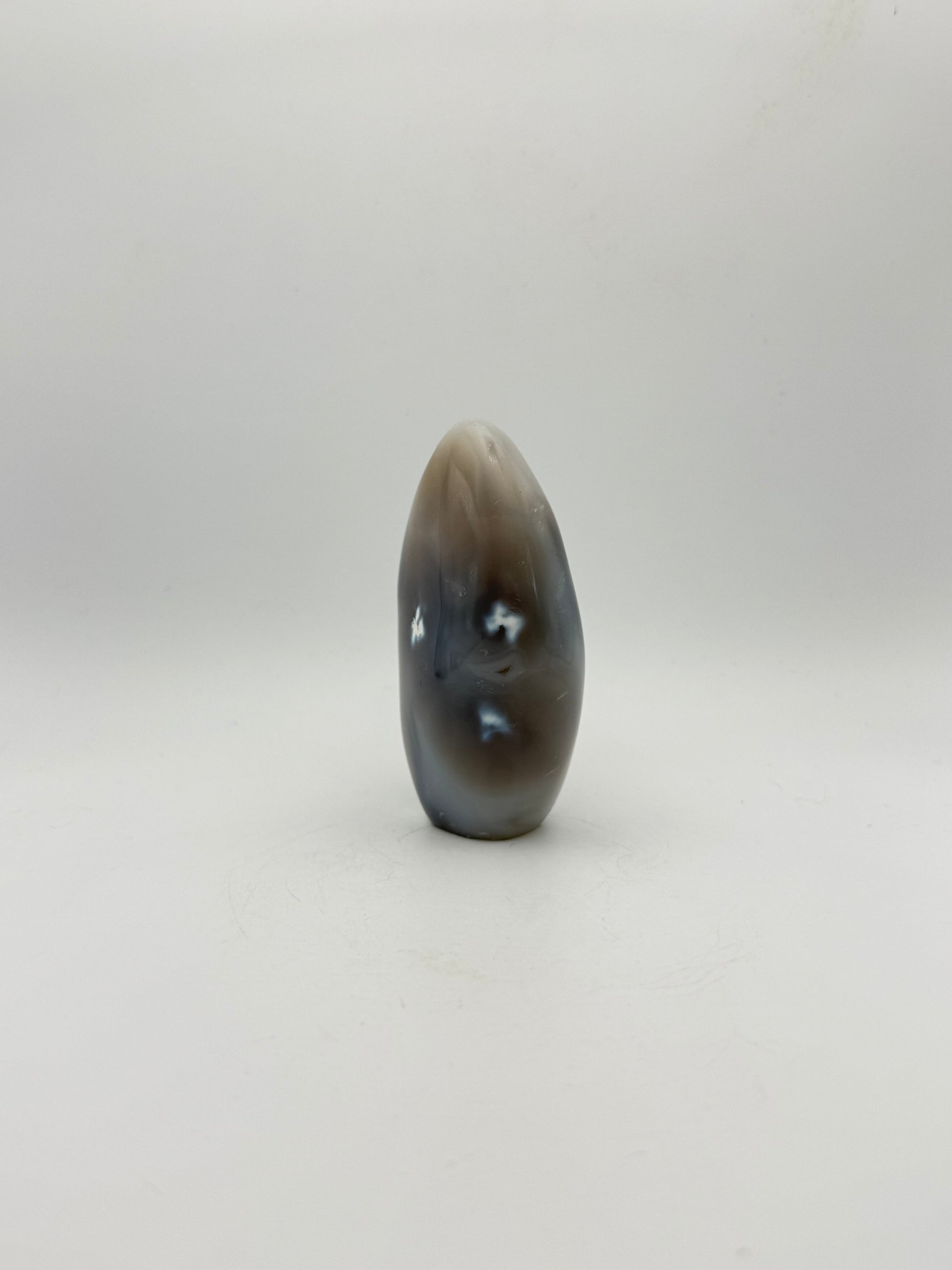 Polished orca agate free form.
