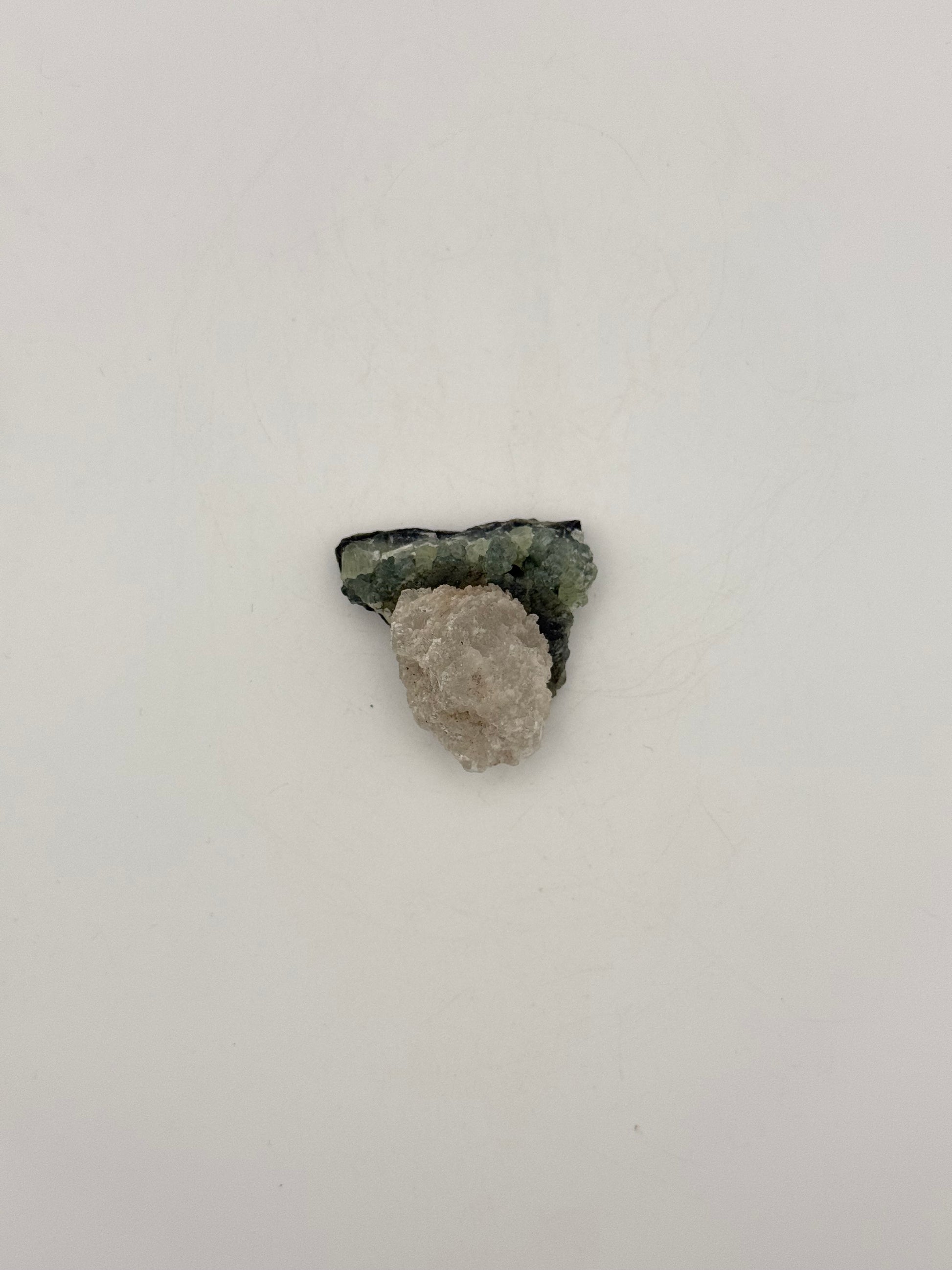 Raw prehnite specimen with amazing green color.