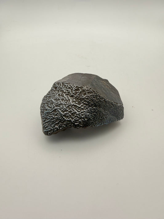 Small raw hematite specimen.