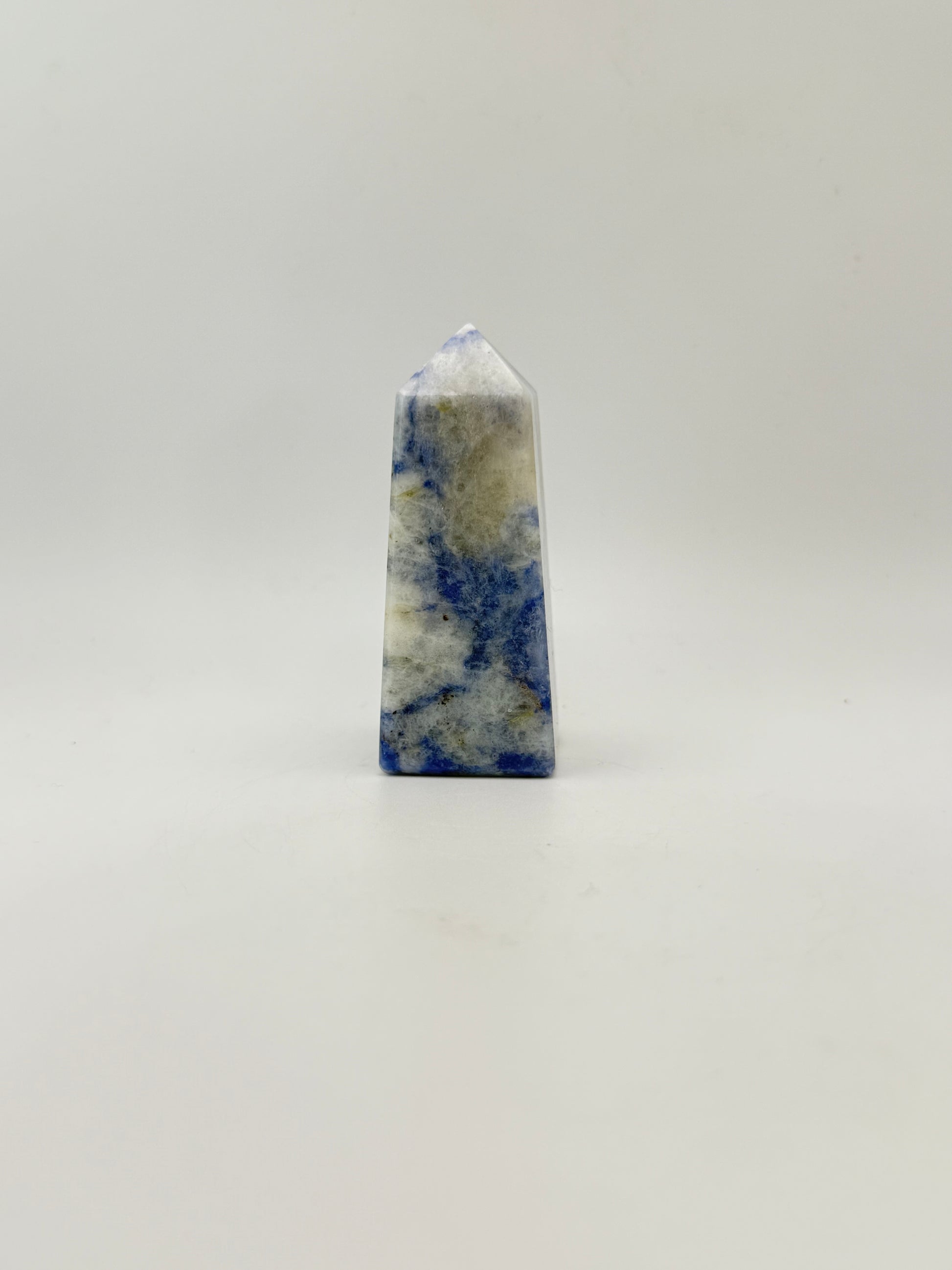 Afghanite four sided tower. Height of 3 inches, width of 1 1/8 inches.