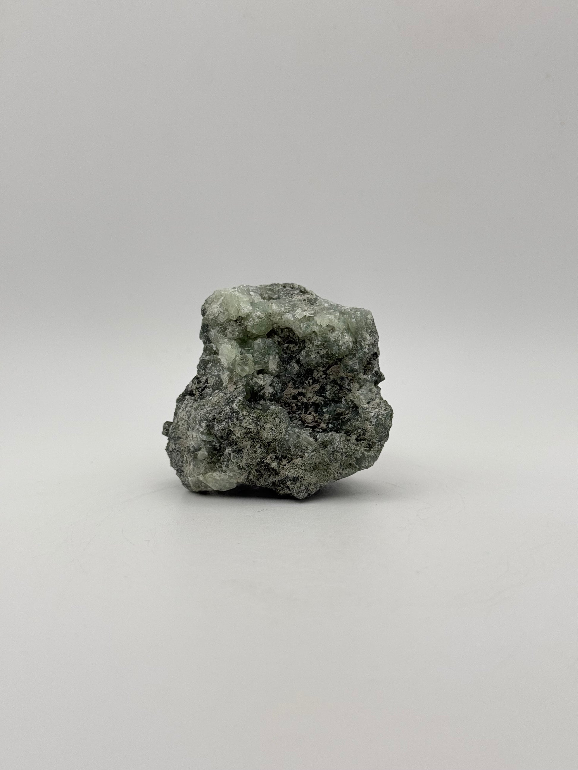 Raw prehnite specimen with amazing green color.