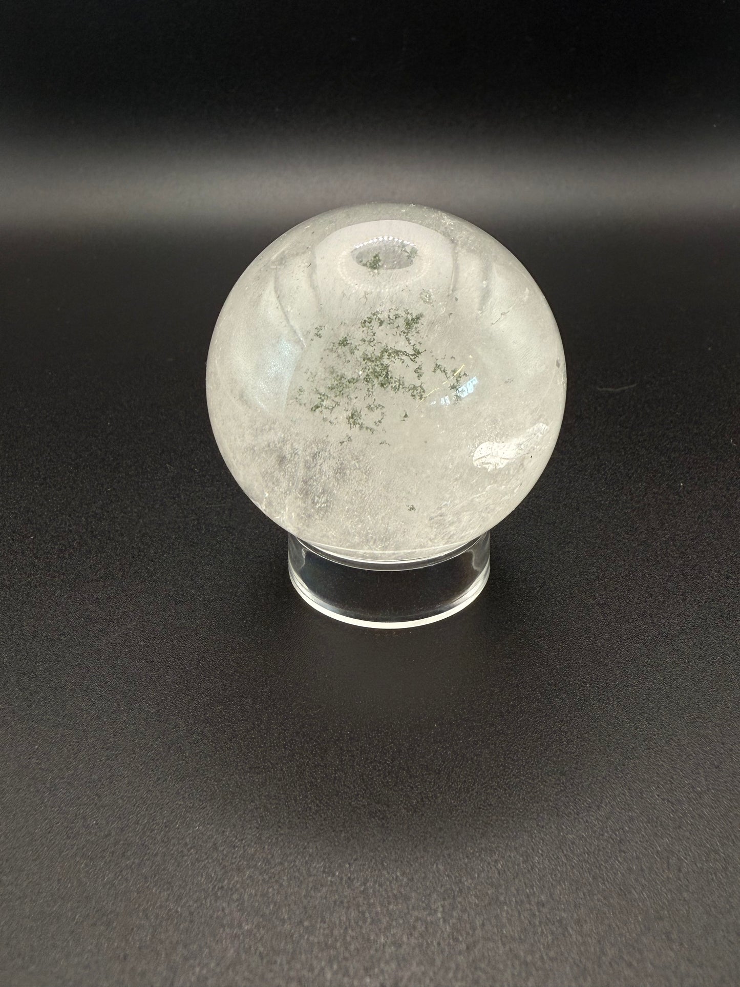Clear quartz polished crystal sphere.