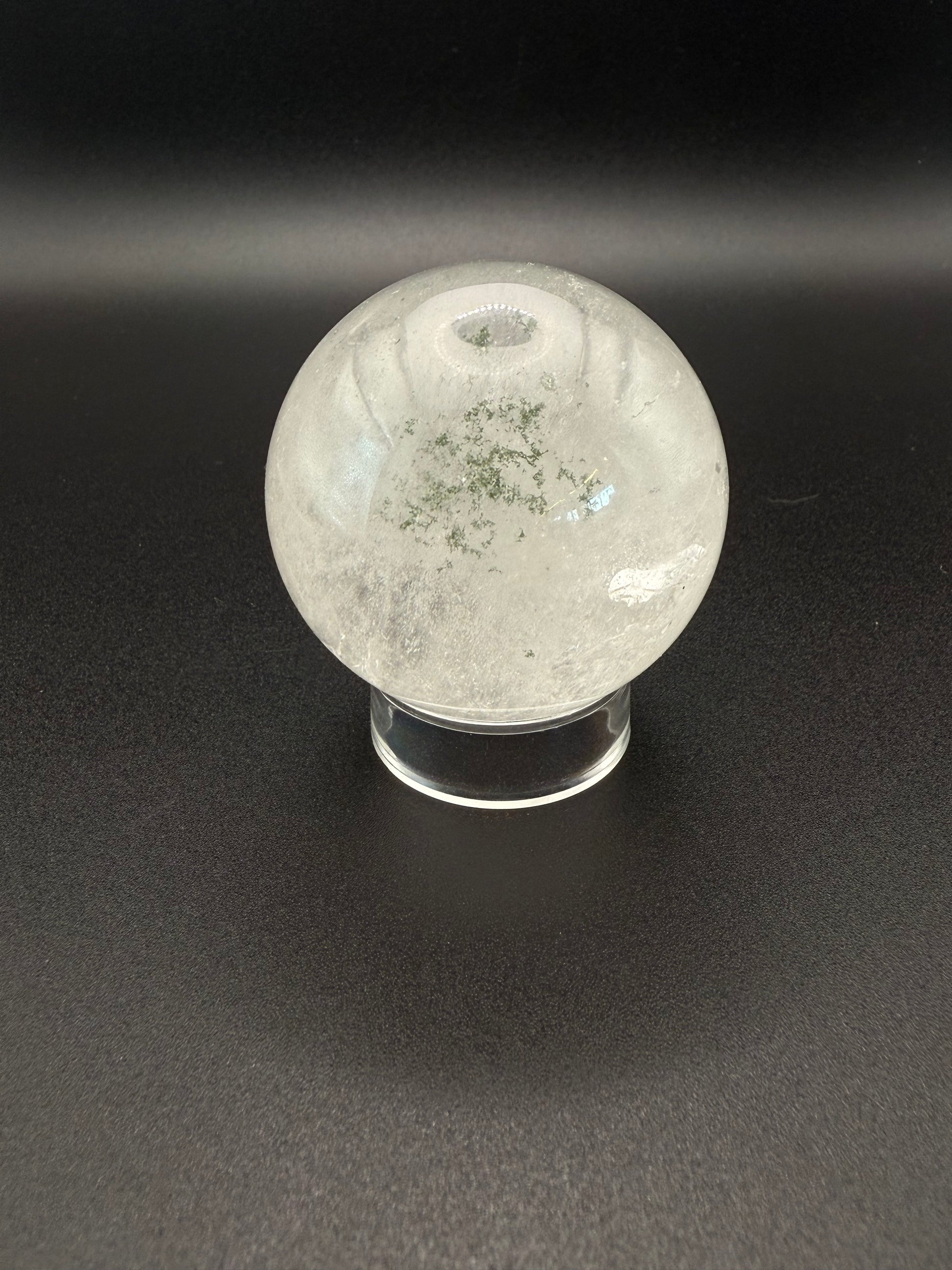 Clear quartz polished crystal sphere.