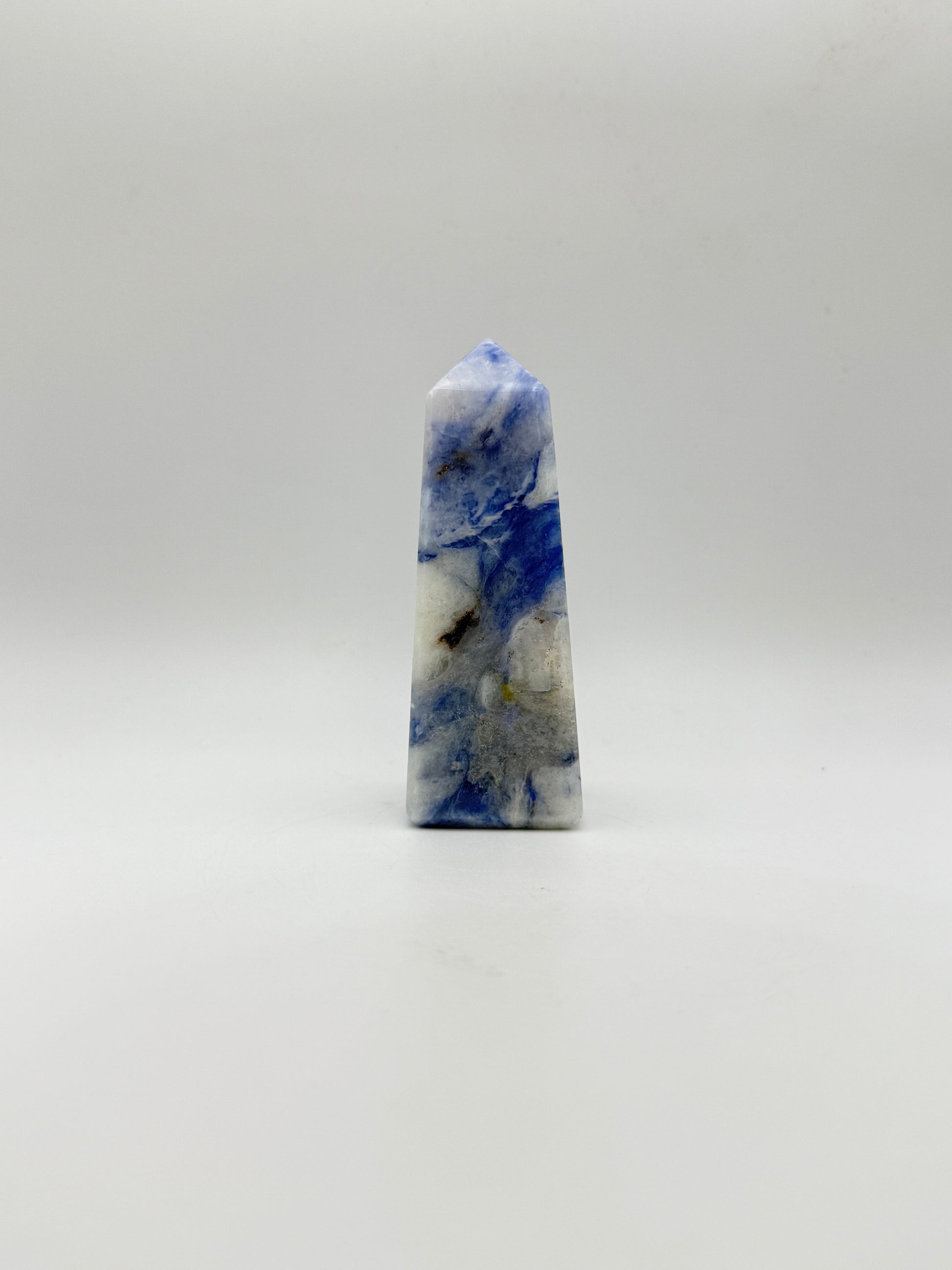 Afghanite four sided tower. Height of 3 1/2 inches, width of 1 1/4 inches.