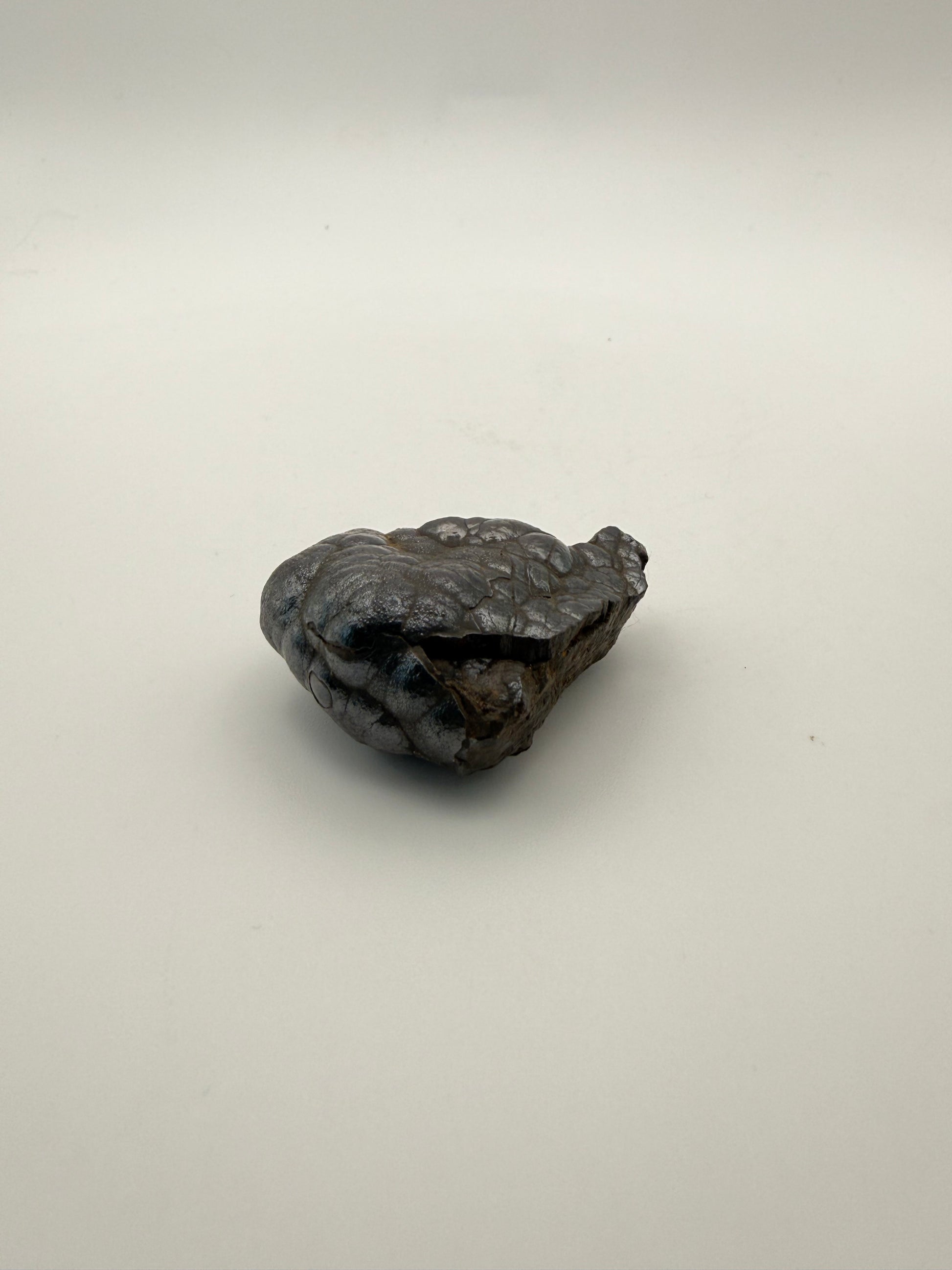 Small raw hematite specimen.