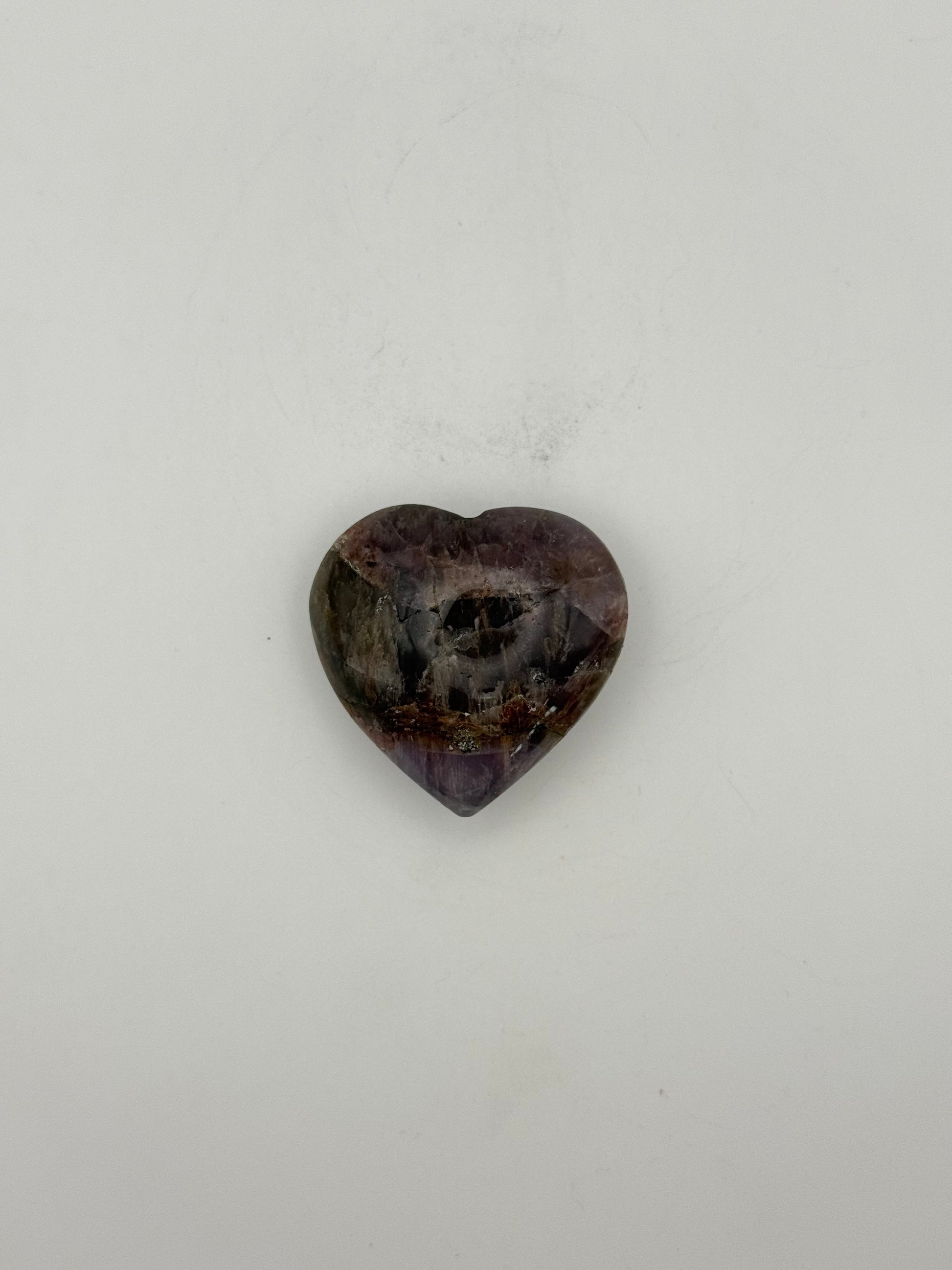 Polished super 7 in the shape of a heart.