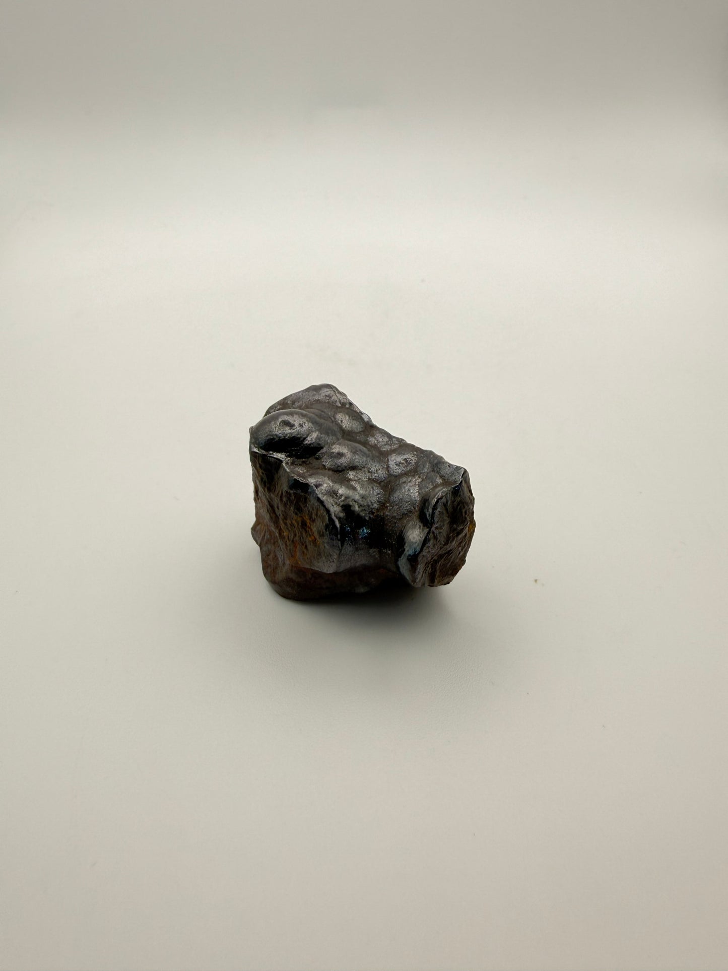 Small raw hematite specimen.