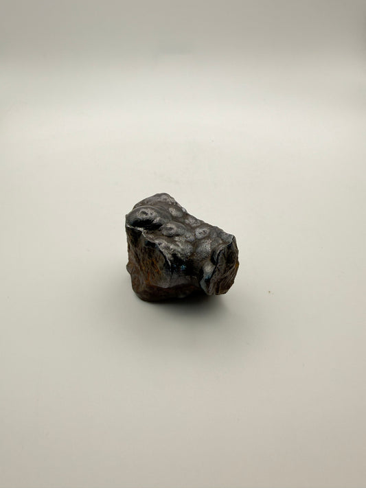 Small raw hematite specimen.