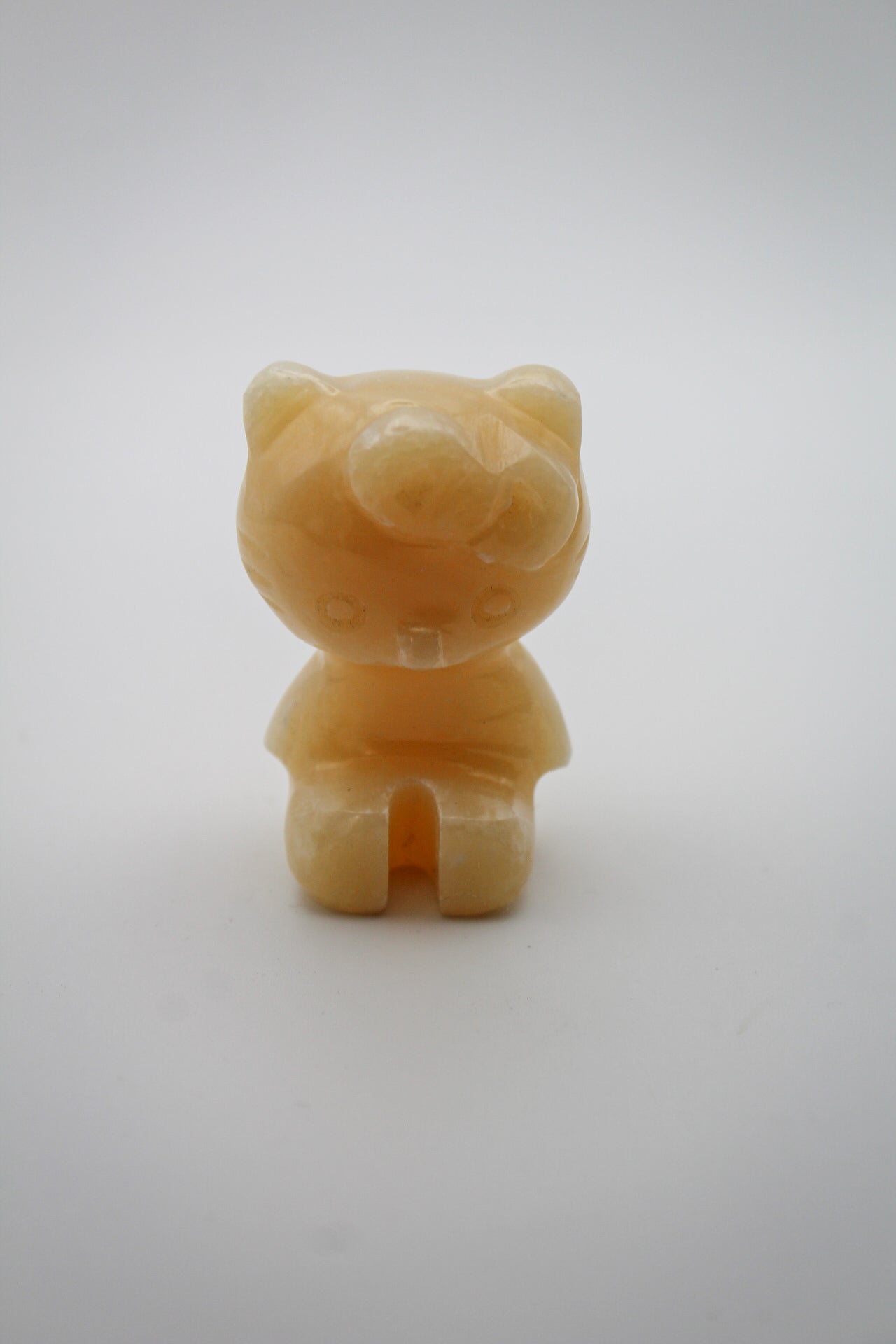 Orange Calcite Hello Kitty Carving