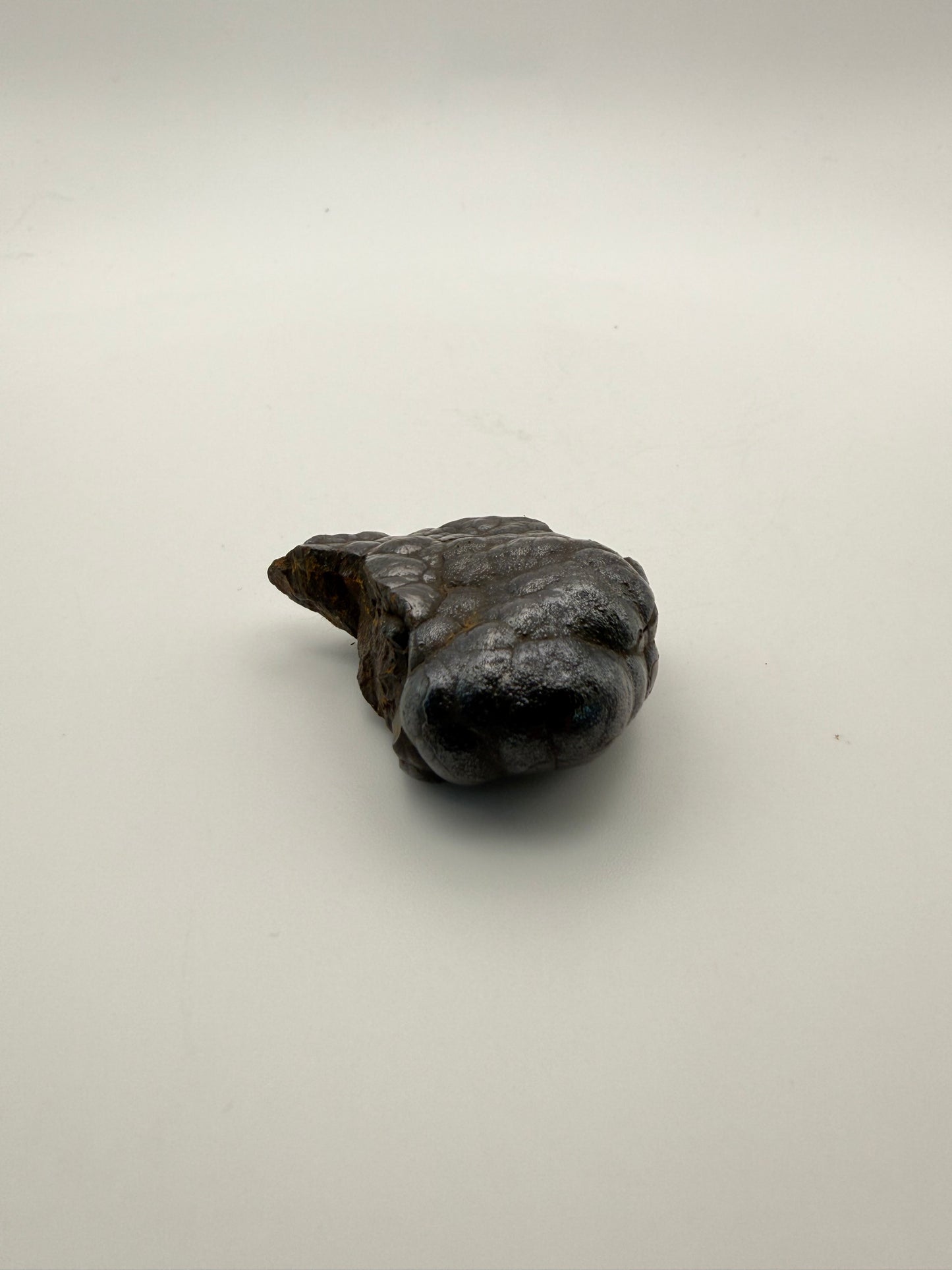 Small raw hematite specimen.