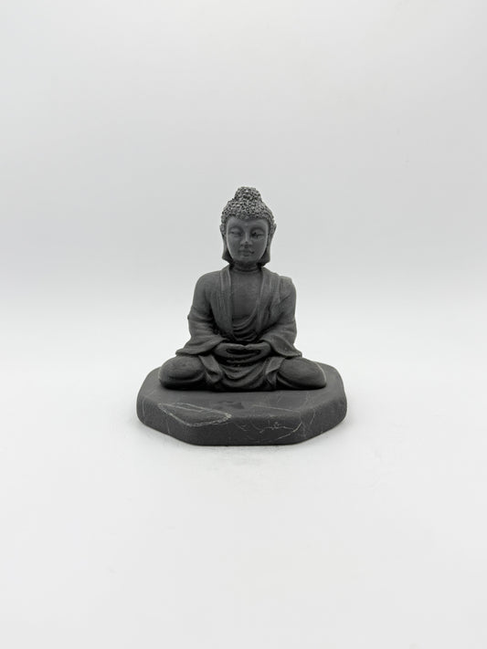 Shungite carving of a buddha.