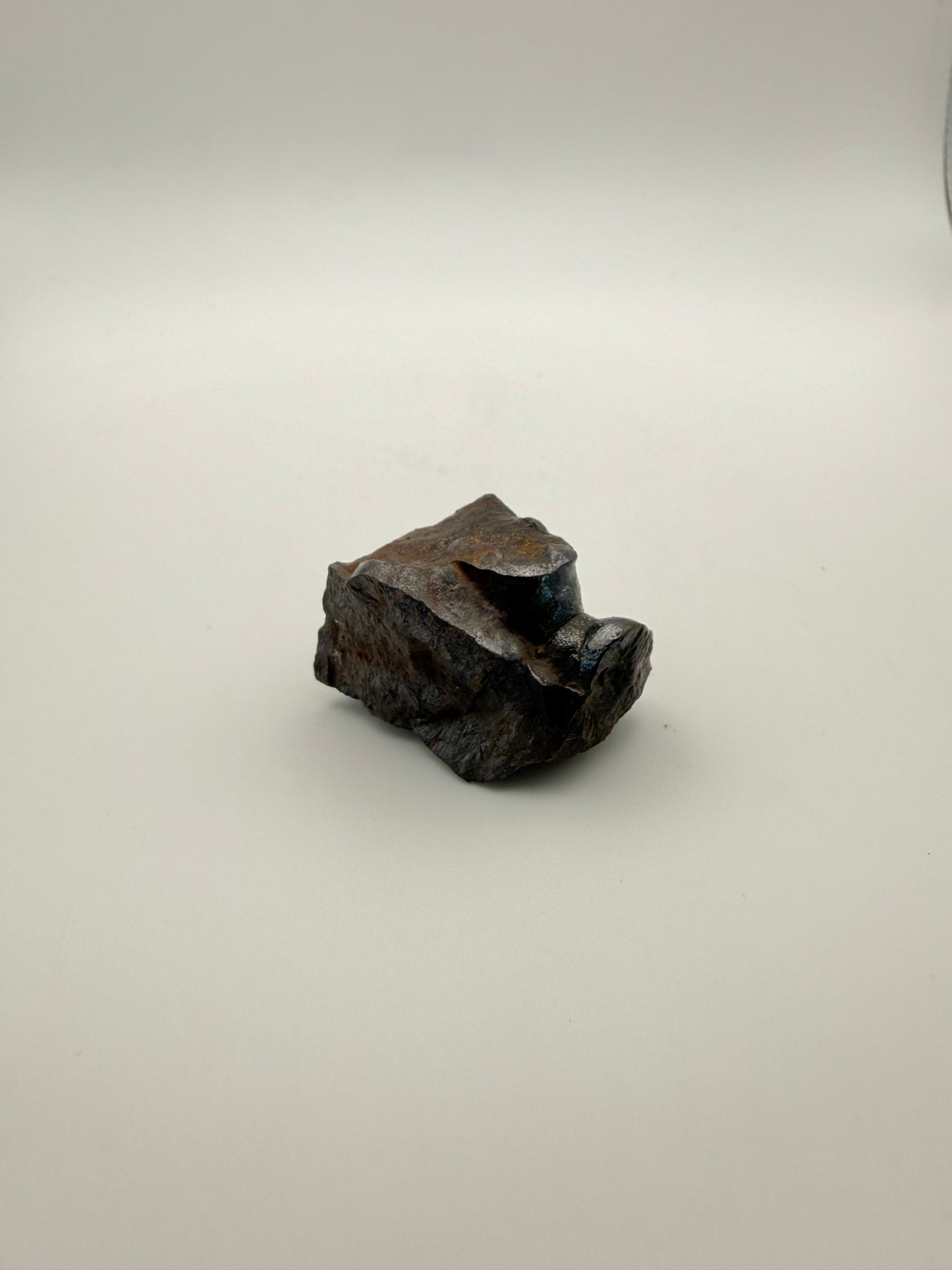 Small raw hematite specimen.