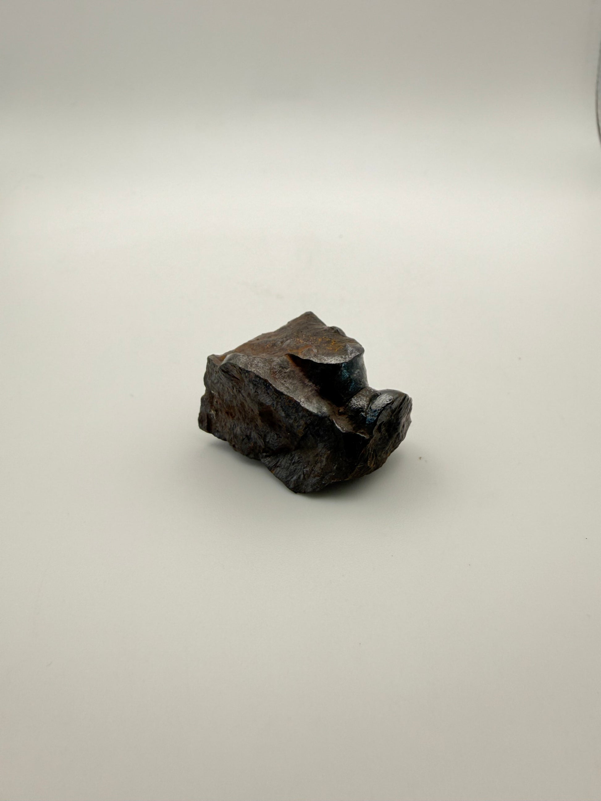 Small raw hematite specimen.