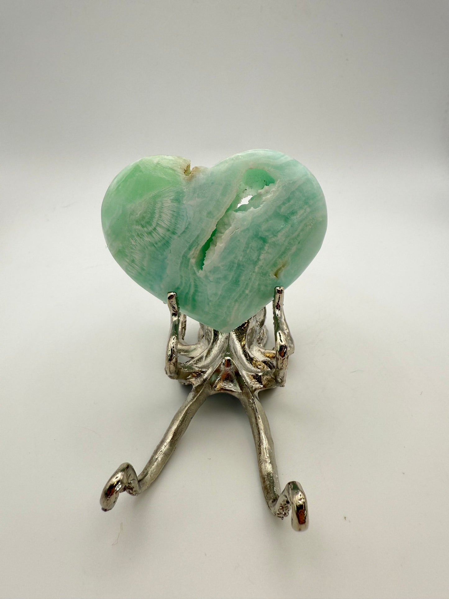 Caribbean Calcite polished crystal in the shape of a heart.