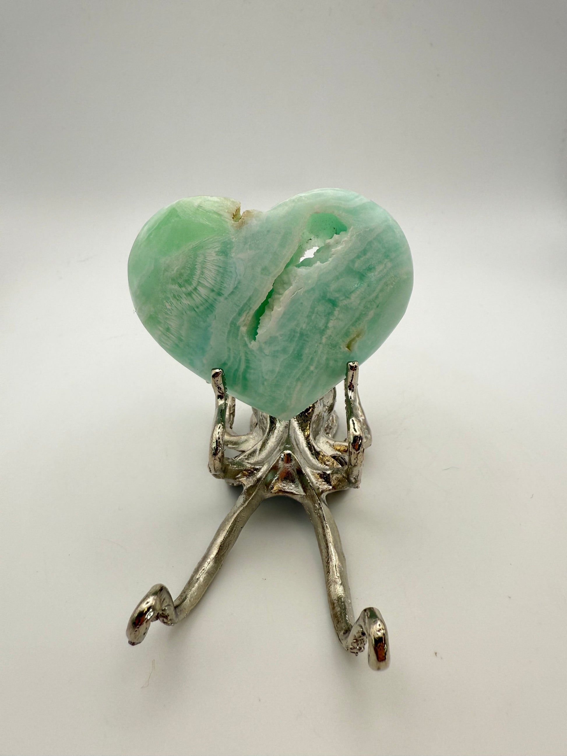 Caribbean Calcite polished crystal in the shape of a heart.