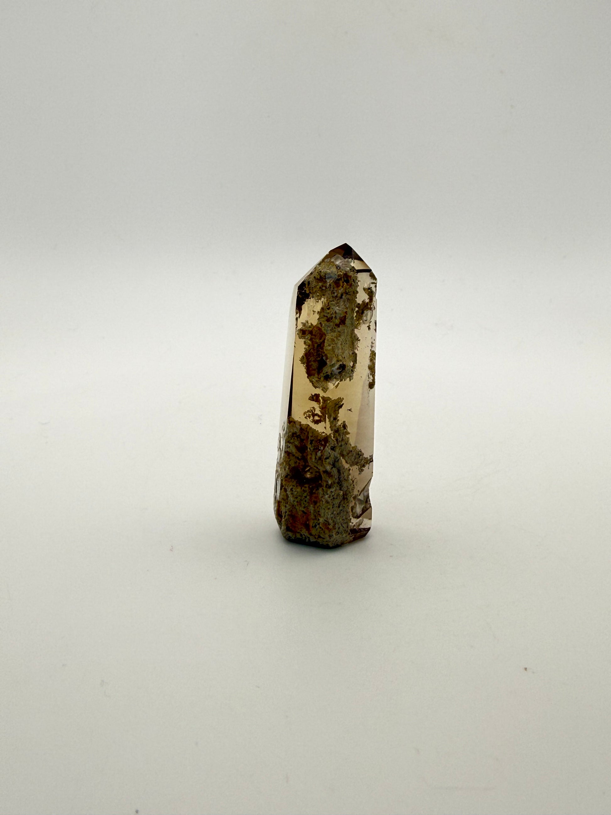 Polished natural citrine point.