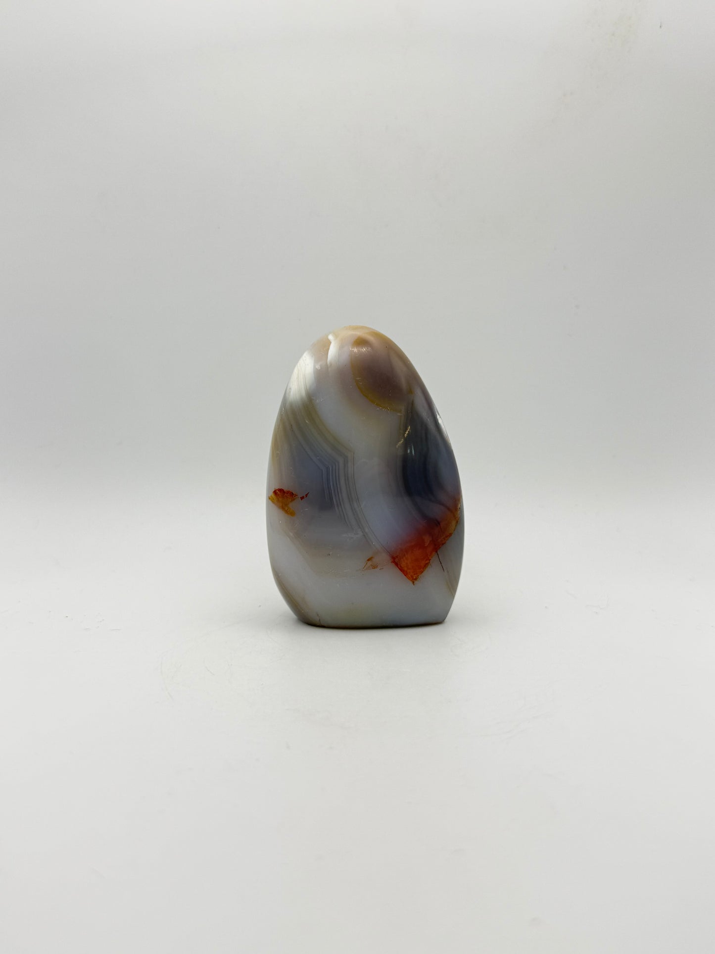 Polished orca agate free form.