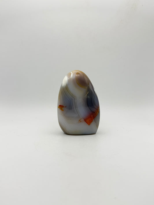 Polished orca agate free form.