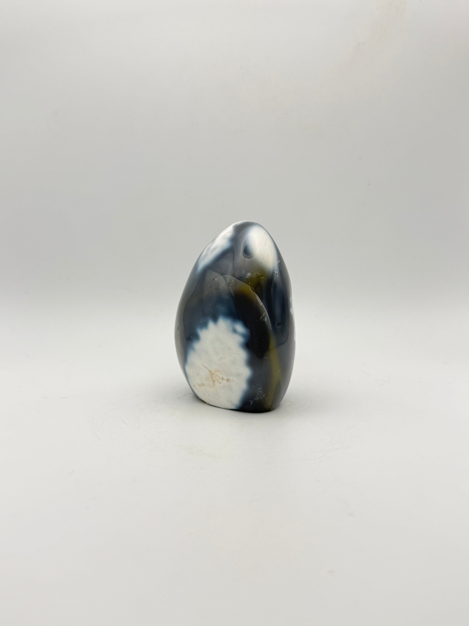 Polished orca agate free form.