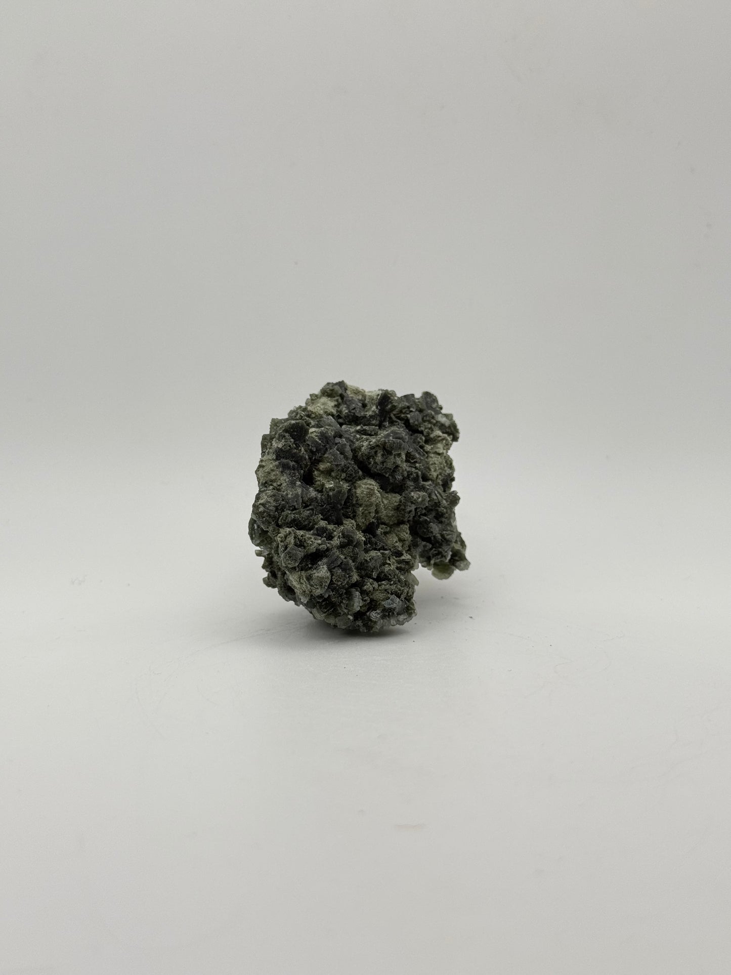 Raw prehnite specimen with amazing green color.