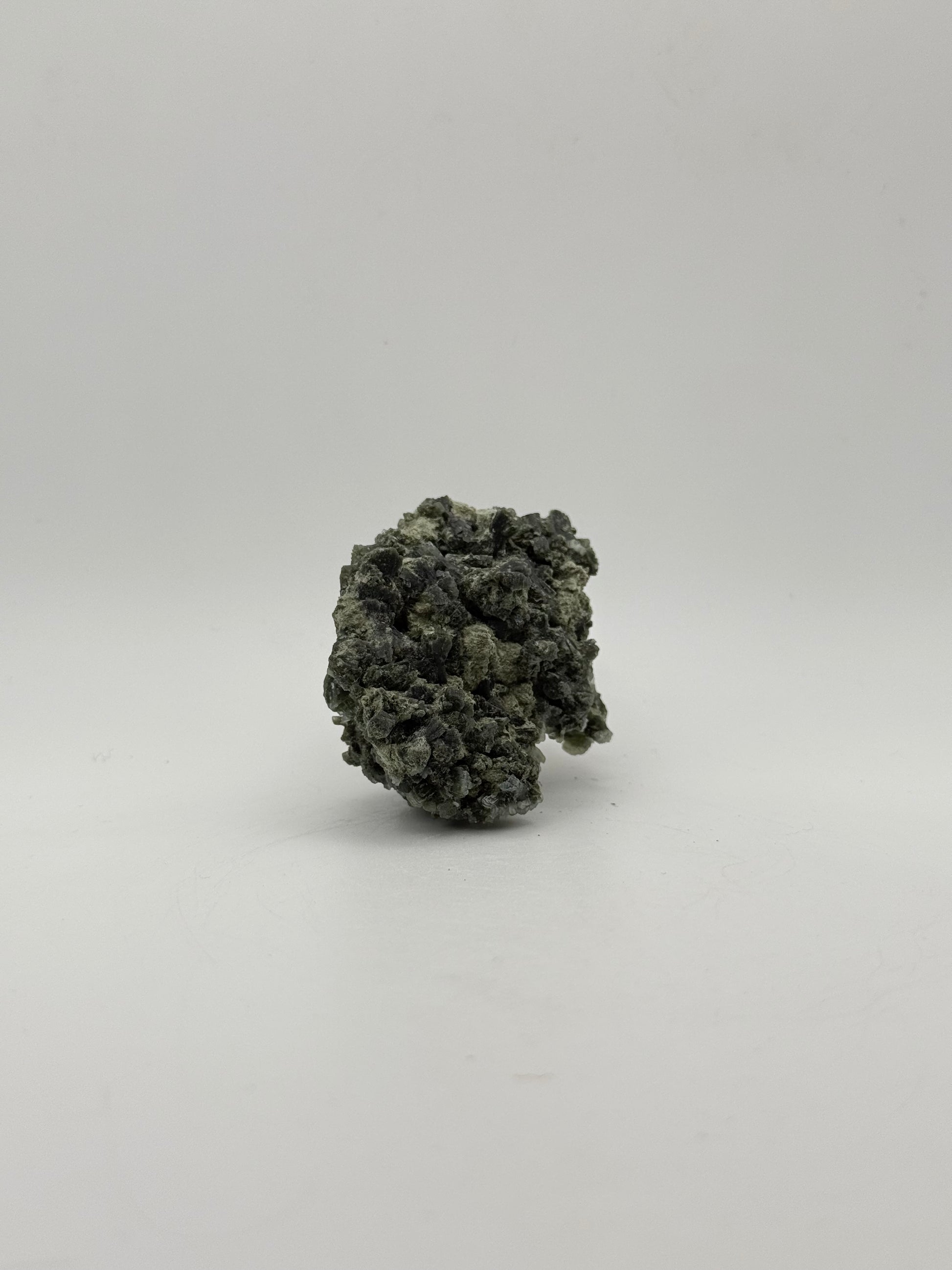 Raw prehnite specimen with amazing green color.