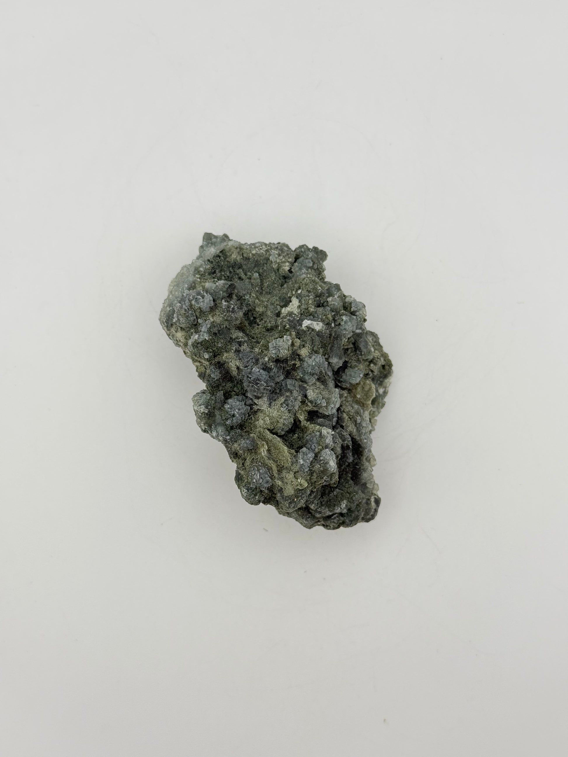 Raw prehnite specimen with amazing green color.