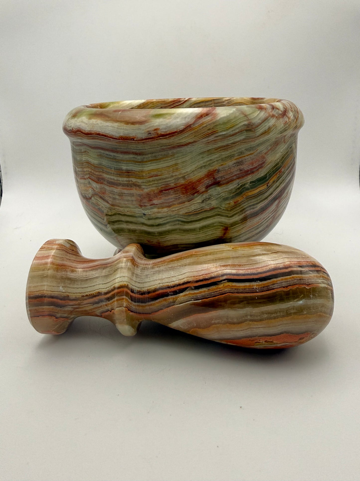 Mortar and pestle made out of onyx stone.