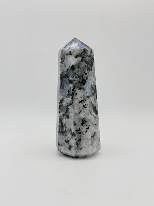 Polished rainbow moonstone tower with nice flashes of blue.