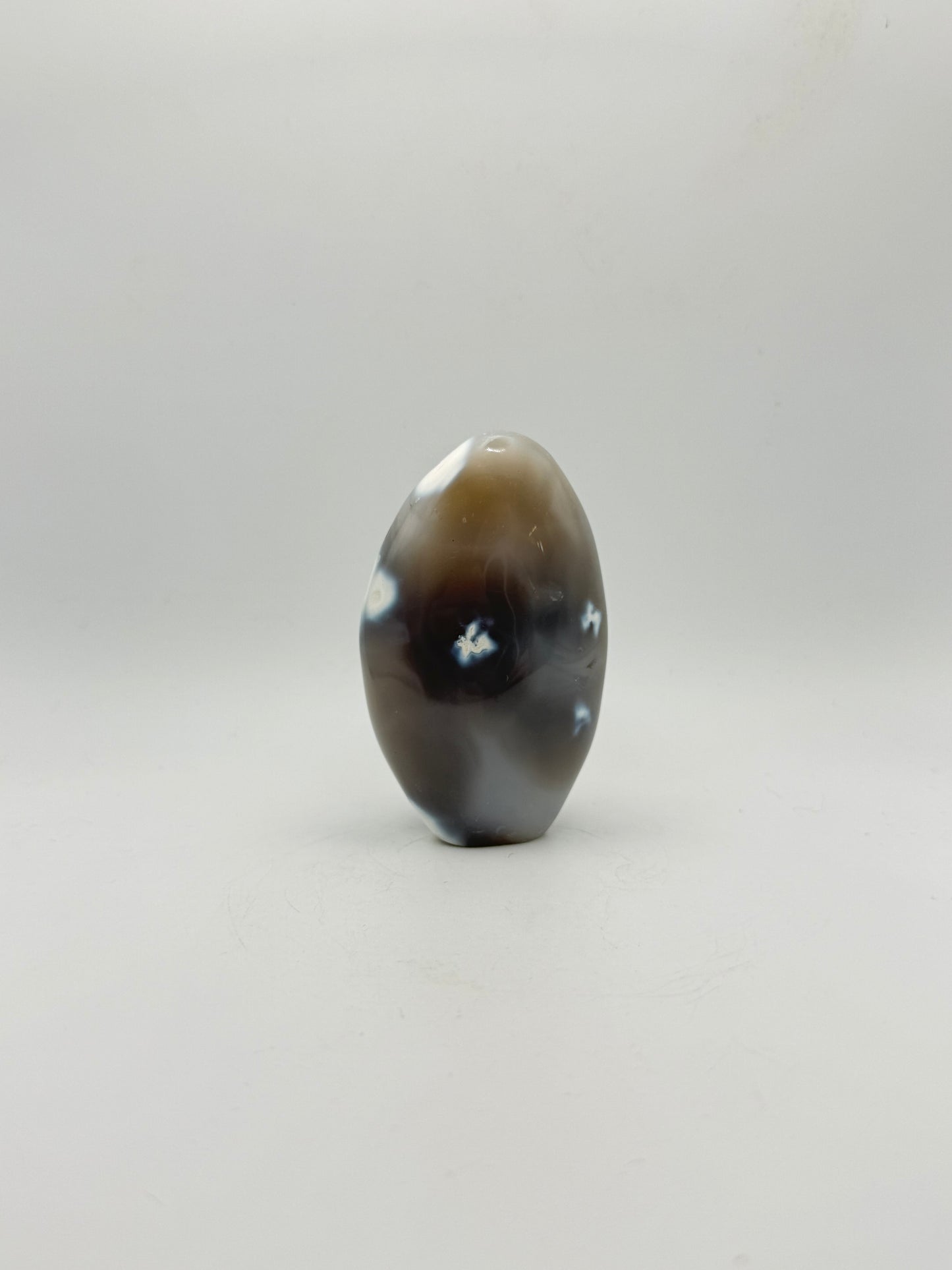 Polished orca agate free form.