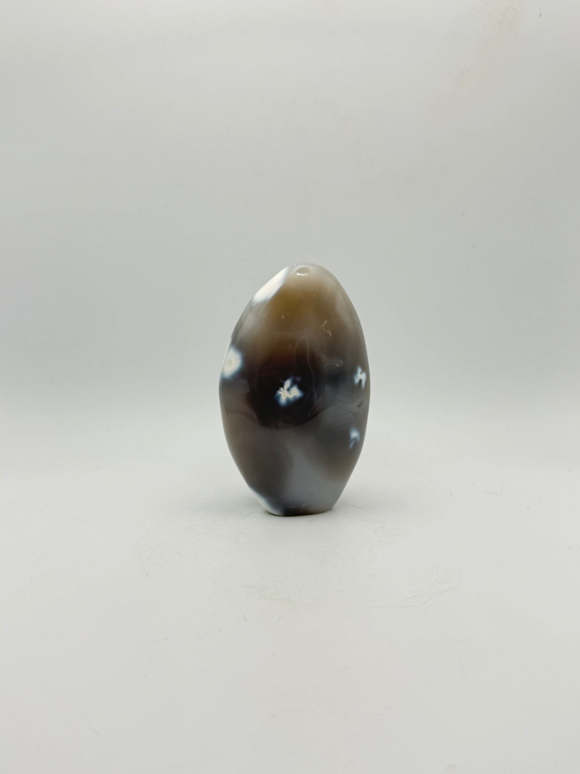 Polished orca agate free form.