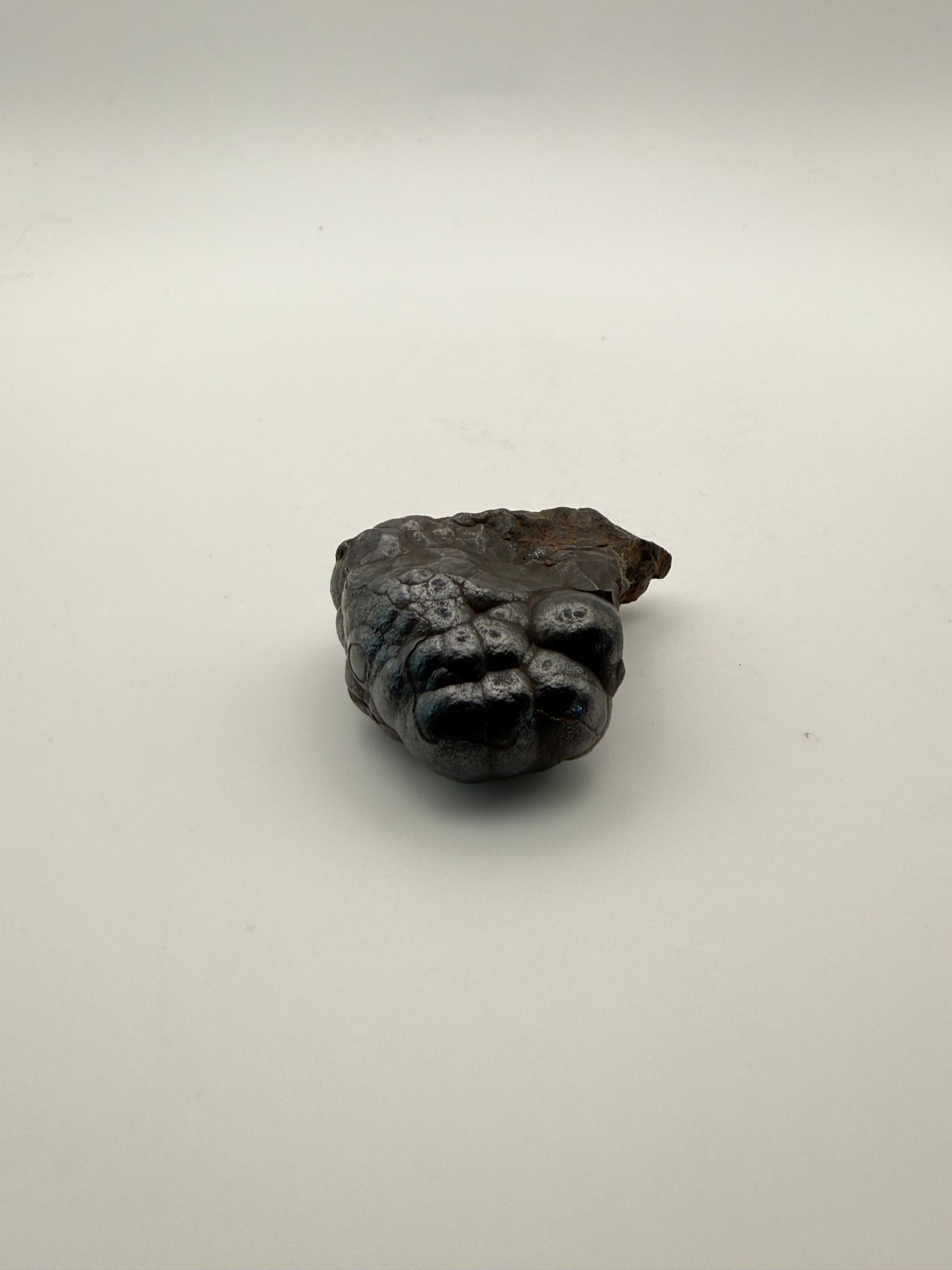 Small raw hematite specimen.