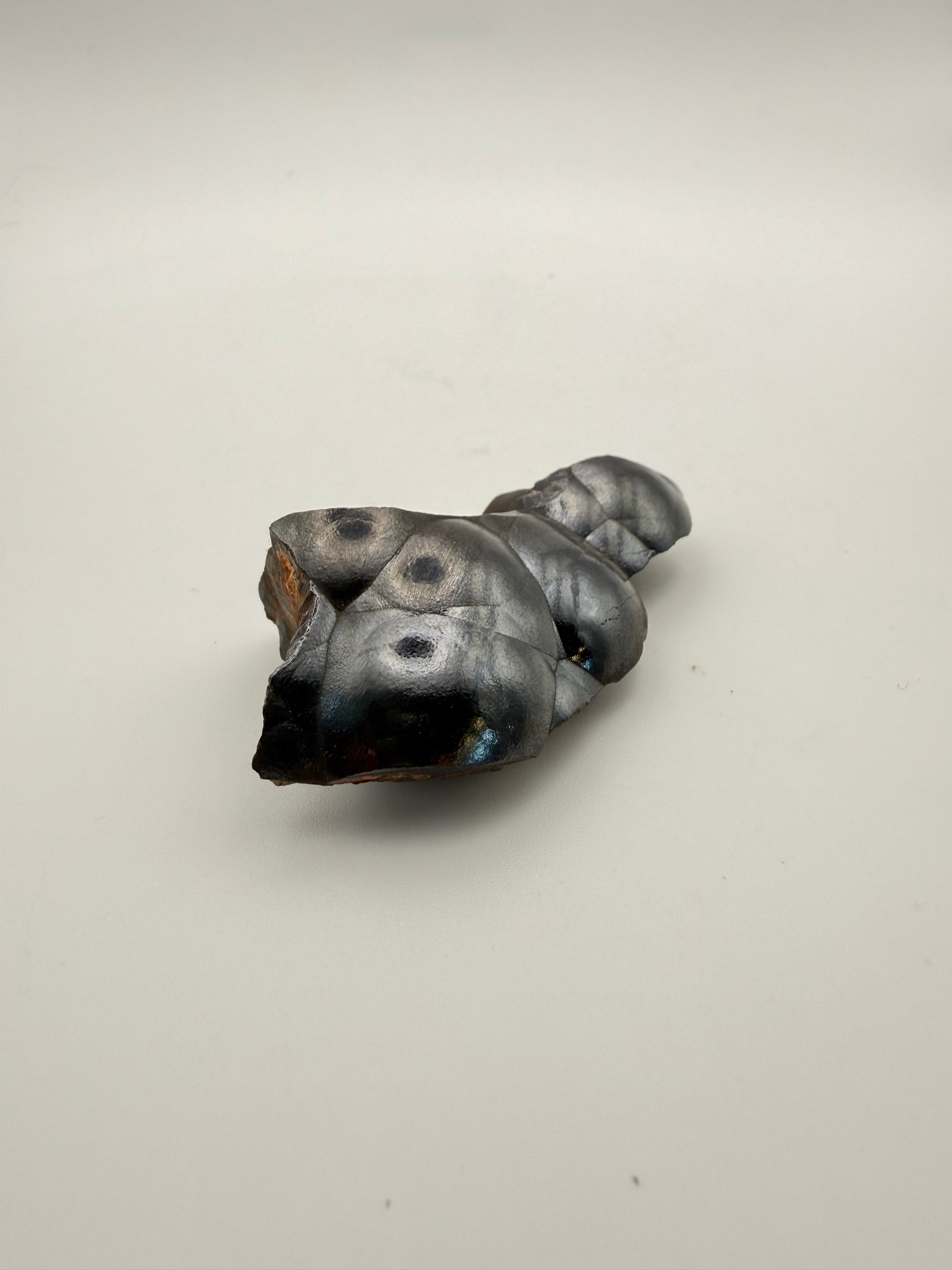 Small raw hematite specimen.