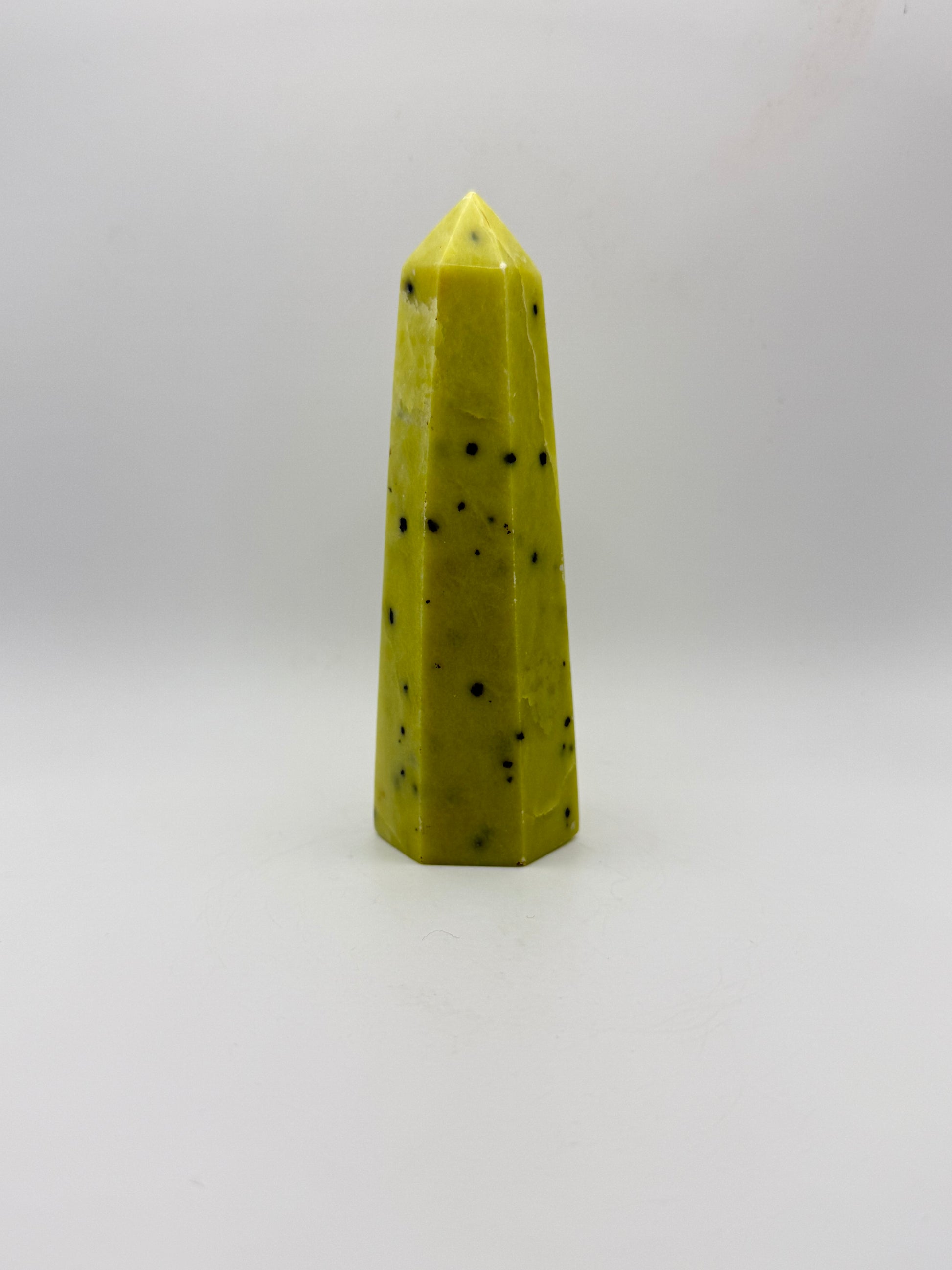 Polished healerite six sided tower.