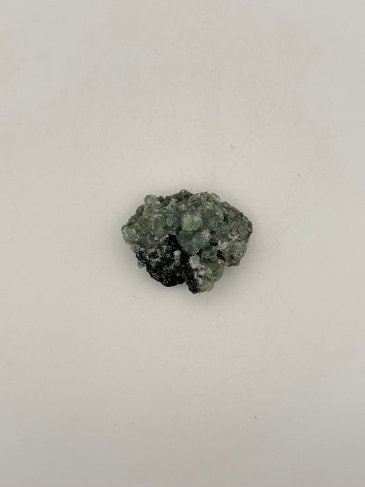 Raw prehnite specimen with amazing green color.