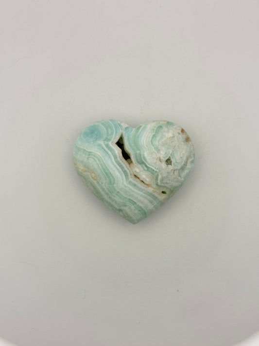 Caribbean Calcite polished crystal in the shape of a heart.