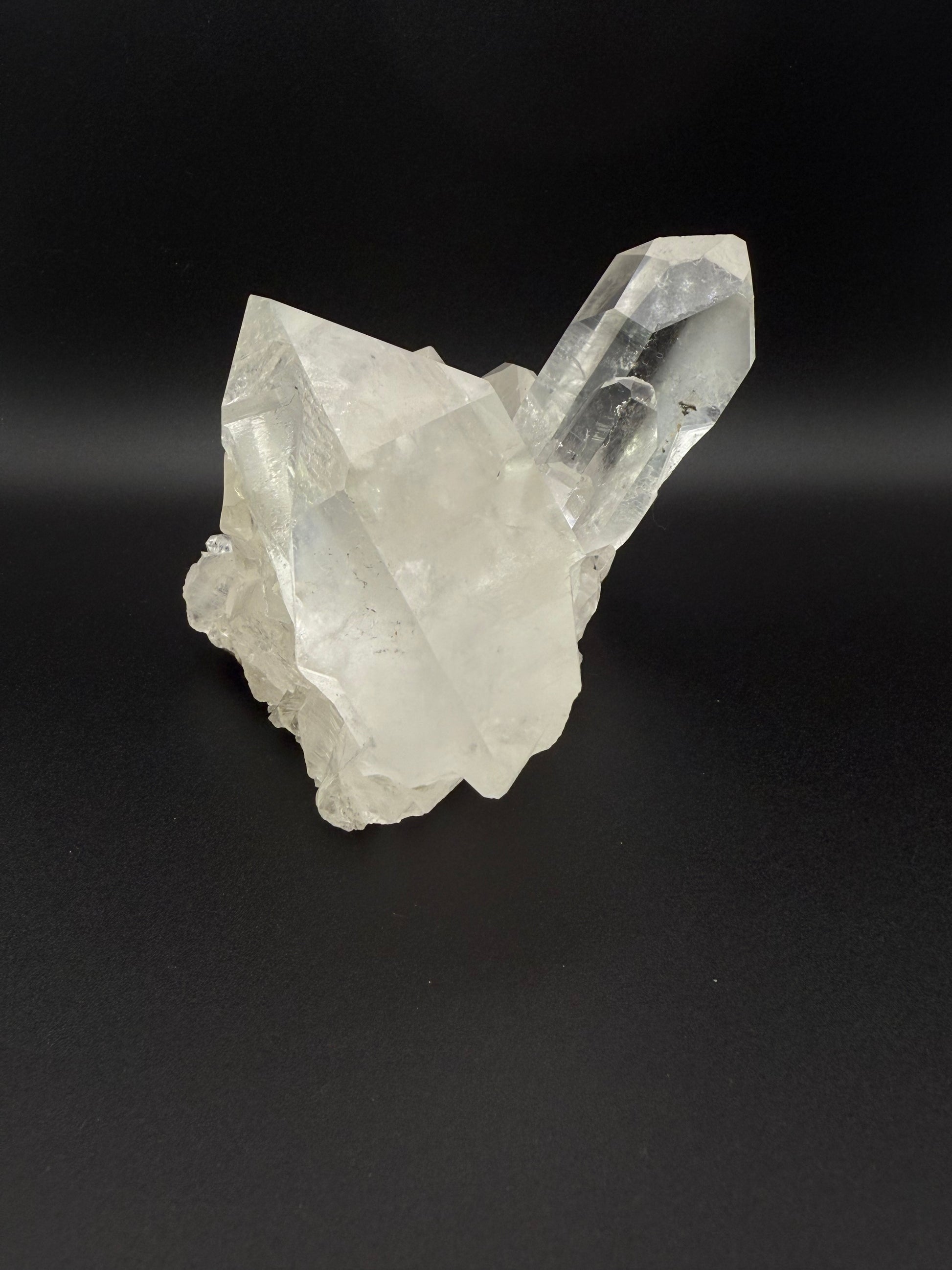 Large cluster of clear quartz crystals.