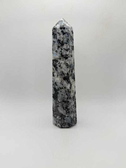 Rainbow moonstone polished tower with nice flashes of blue.