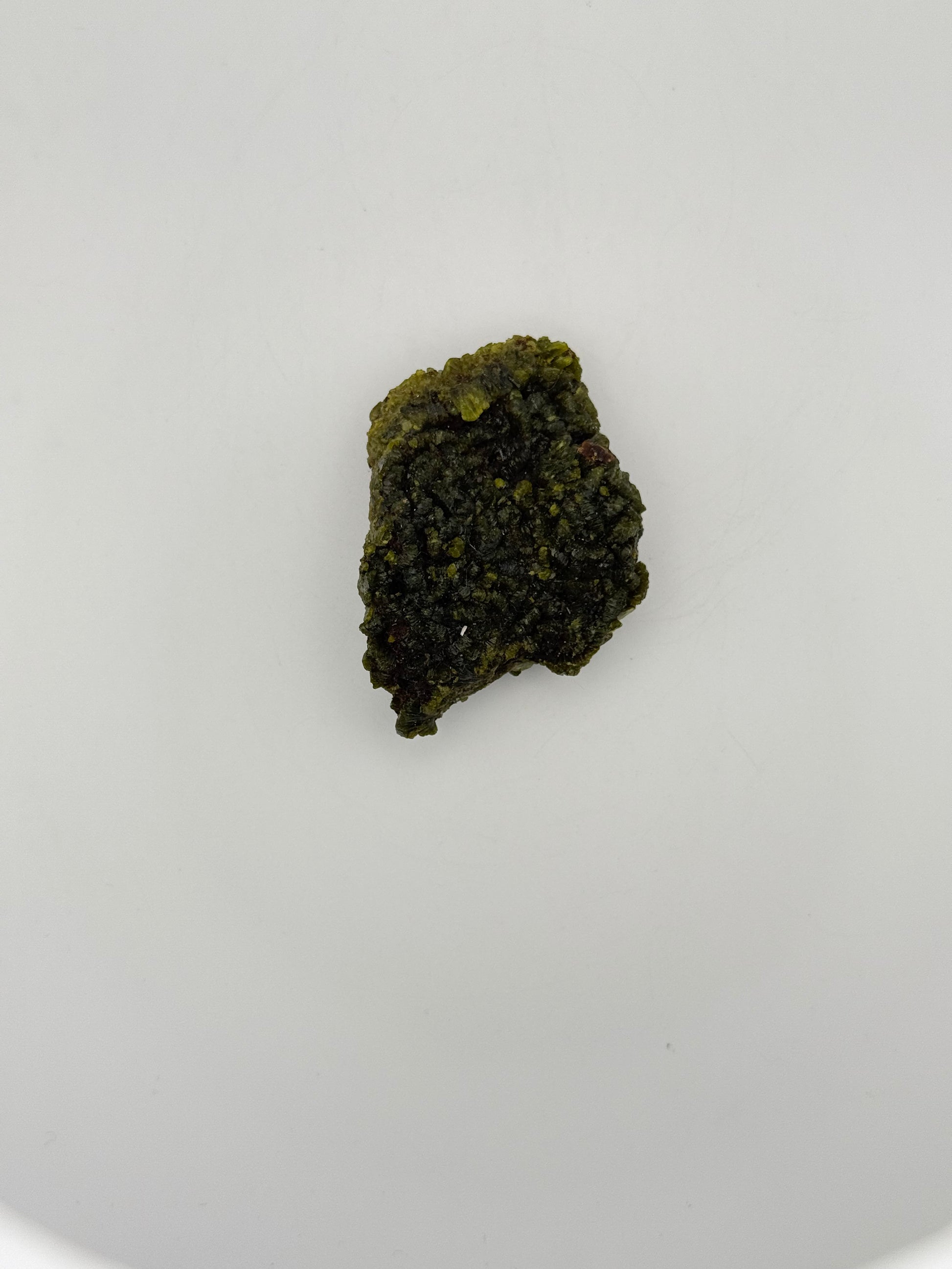 Epidote crystal cluster with good green color.
