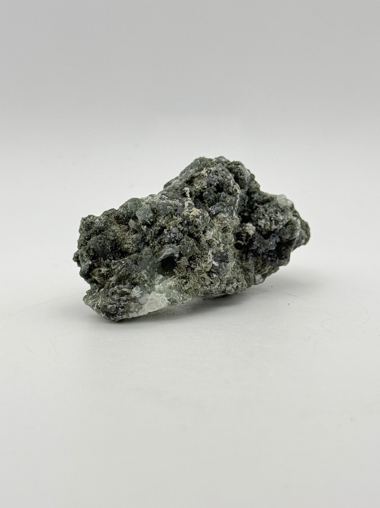 Raw prehnite specimen with amazing green color.