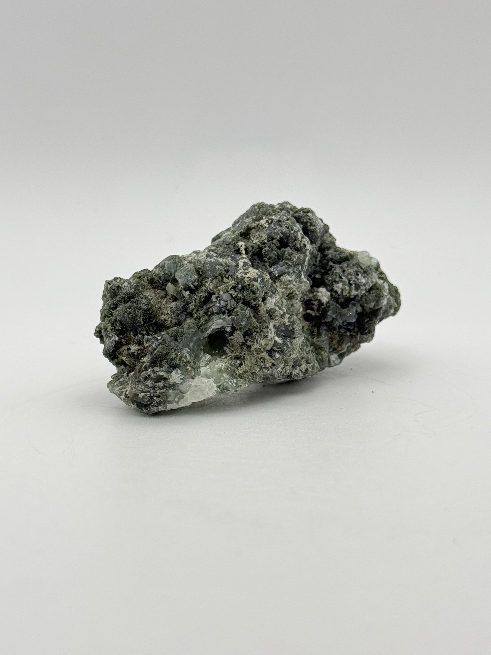 Raw prehnite specimen with amazing green color.