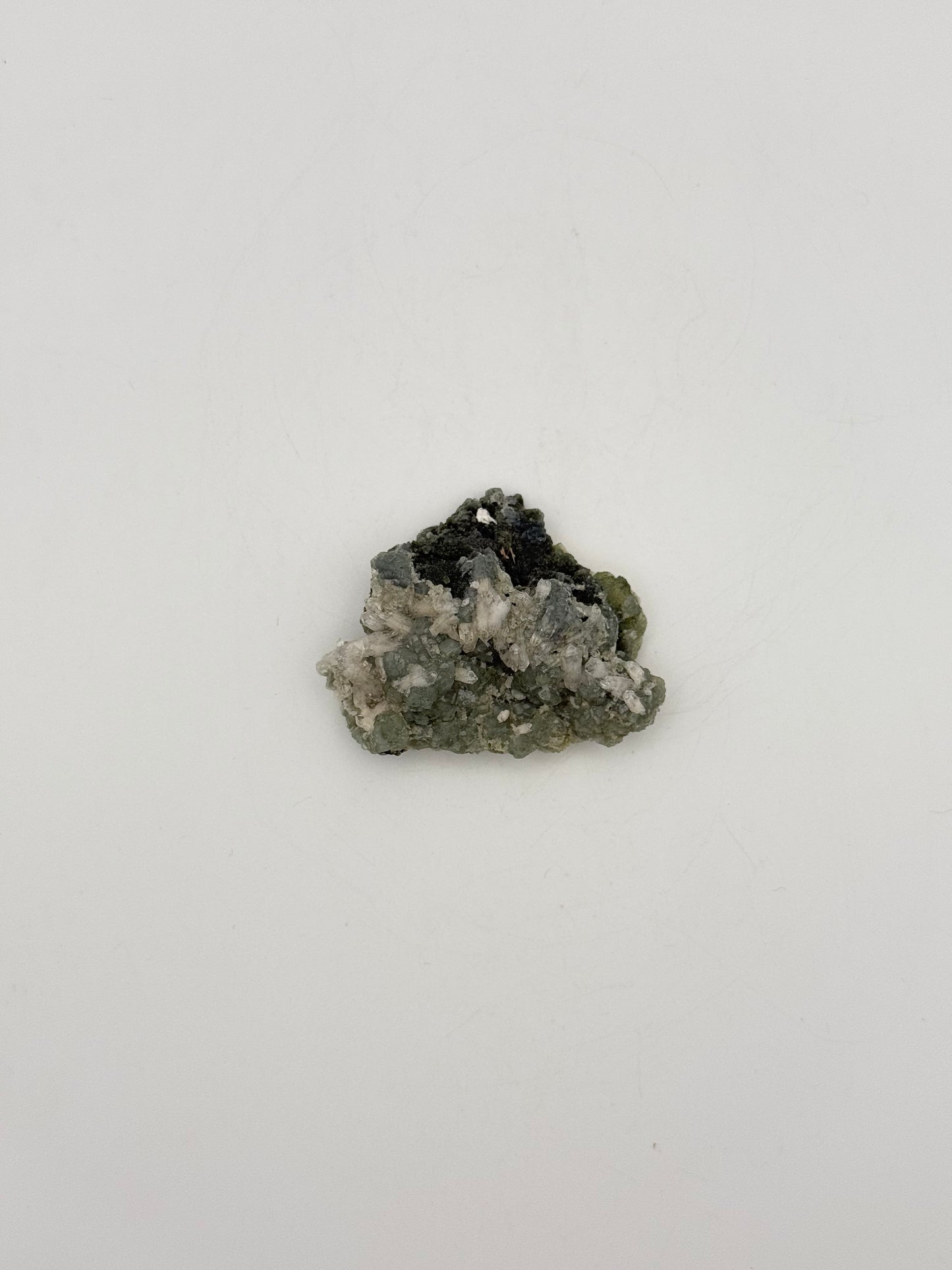 Raw prehnite specimen with amazing green color.