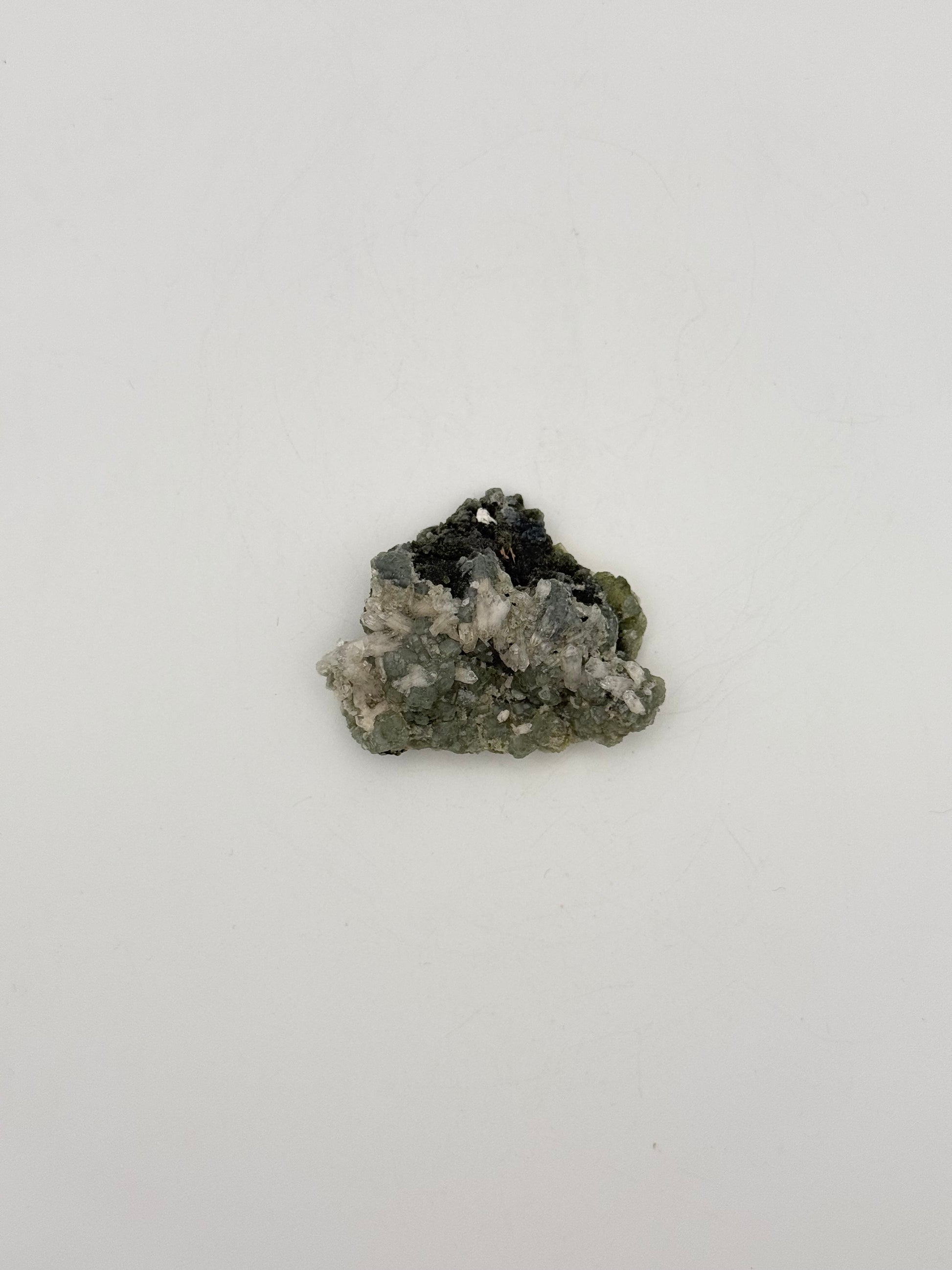 Raw prehnite specimen with amazing green color.