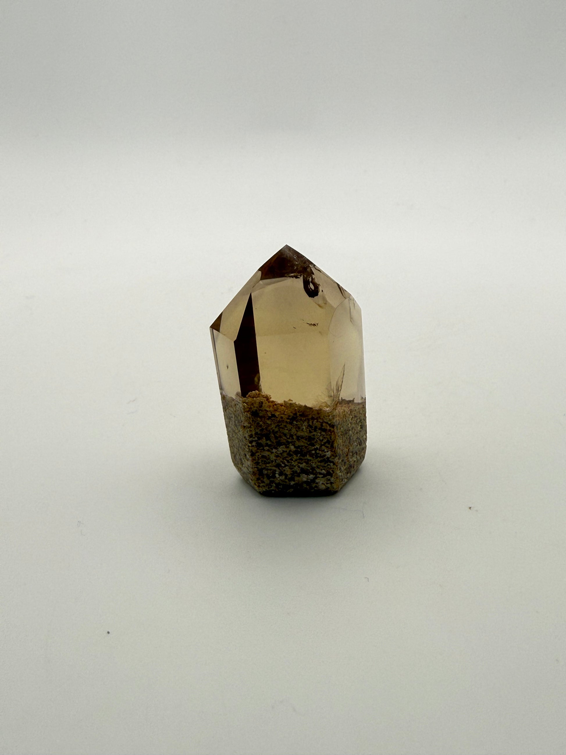 Polished natural citrine point.