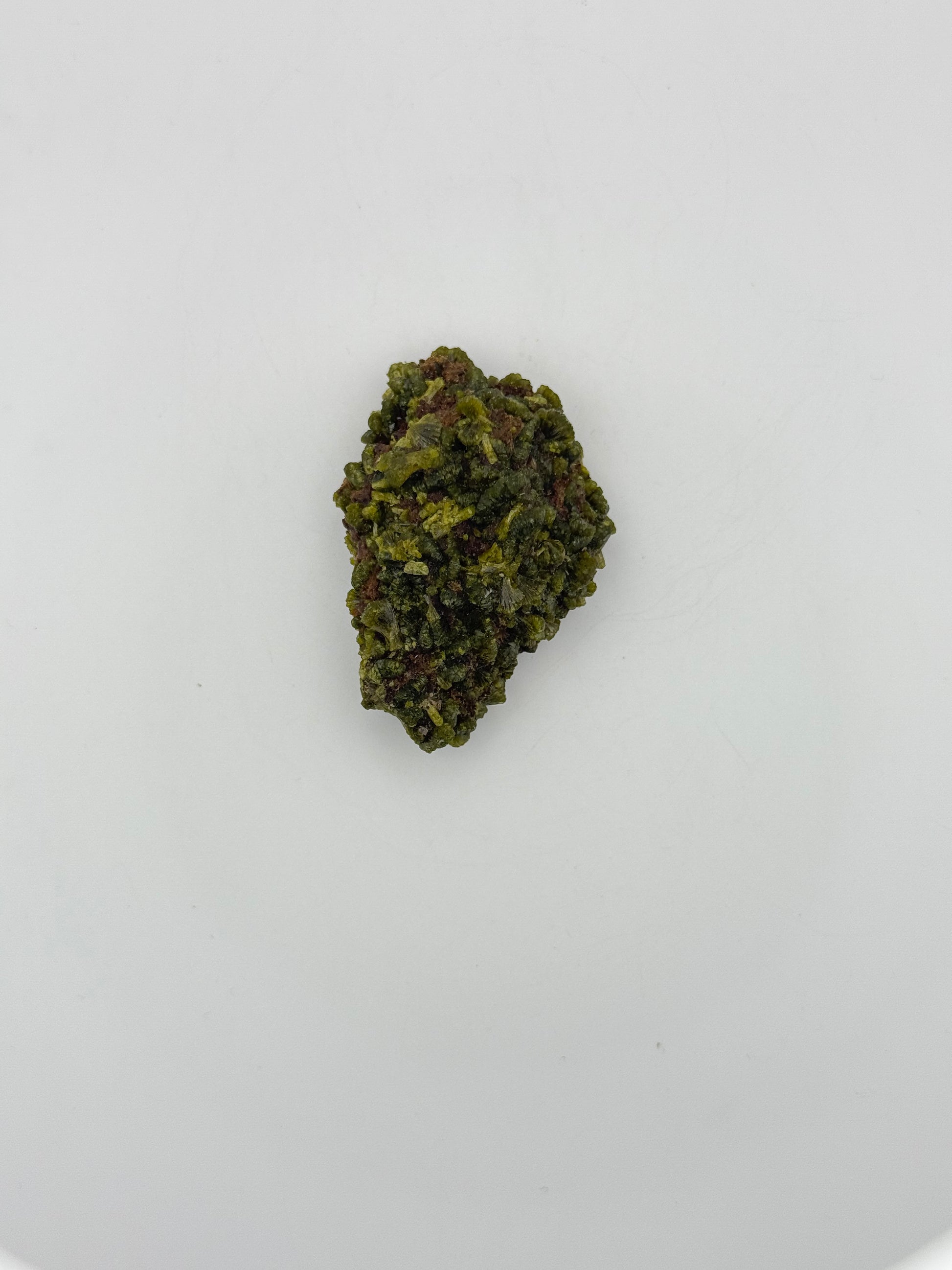 Epidote crystal cluster with good green color.
