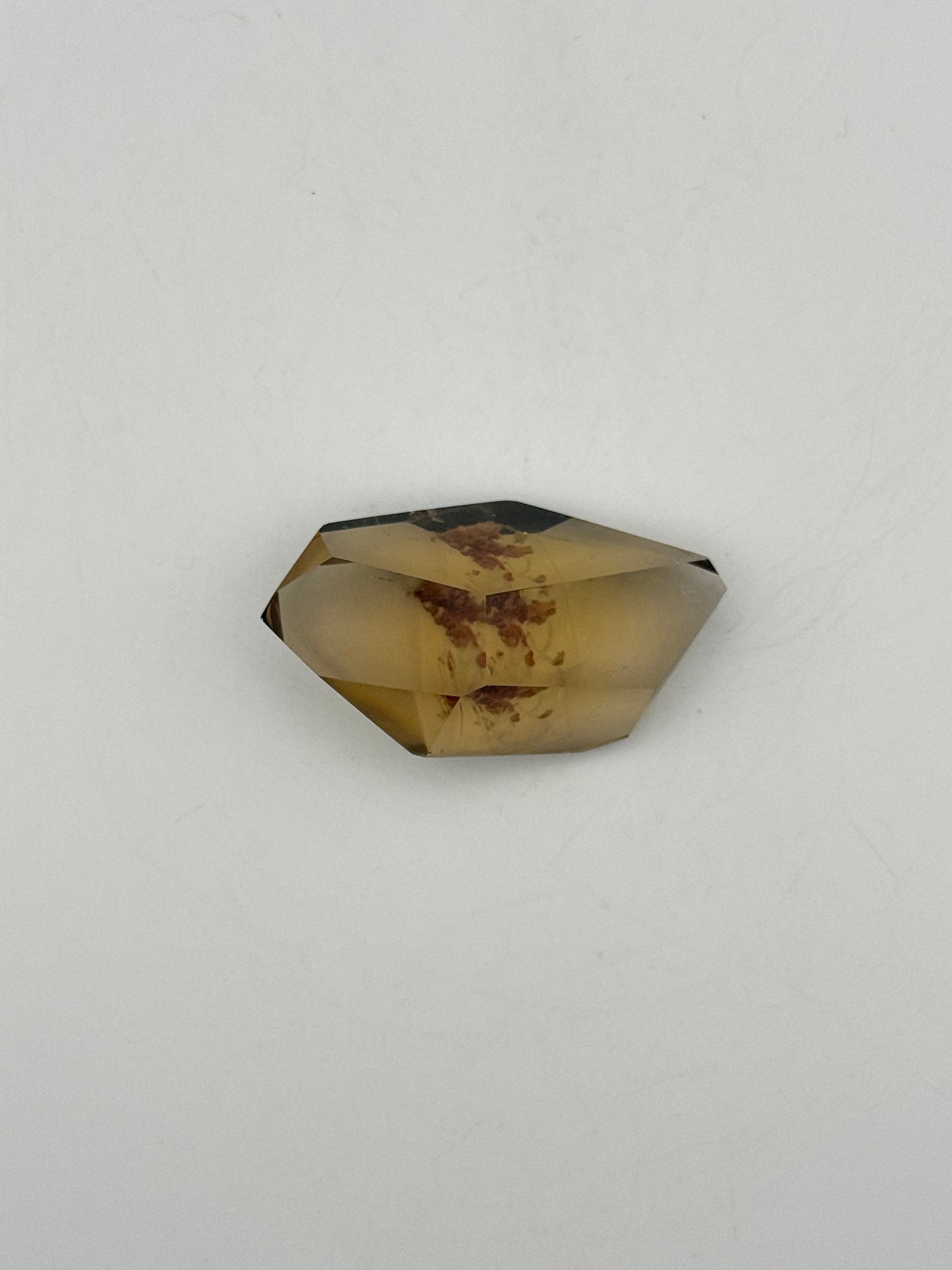 Polished natural citrine point.